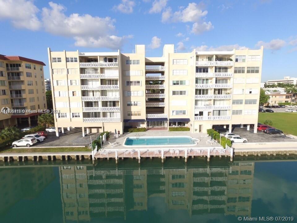 Tenant's dream! Fully Furnished! Beautifully updated 1 bedroom, 1.5 bath unit in Bay Harbor Islands. This property features 24' white porcelain floors, spacious kitchen with white cabinets and stainless steel appliances. Large bedroom has en suite bathroom with double sink and walk-in closet. Large living room with balcony. Building offers BBQ area and pool overlooking the canal, with beautiful views! Walking distance to the Beach, Bal Harbour shops, restaurants, grocery stores, places of worship and more! A must see -- will not last long!