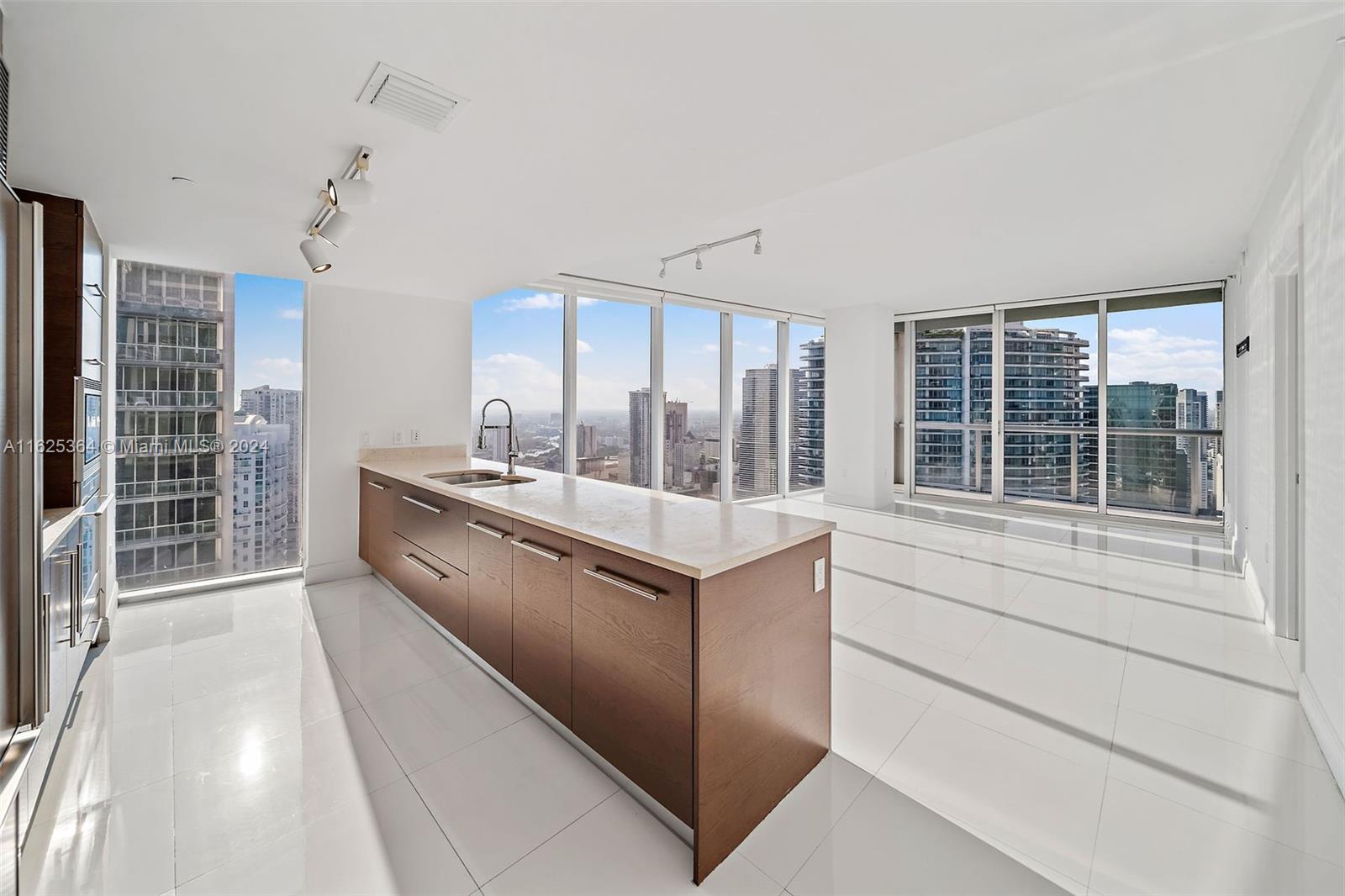 Just Reduced  47th floor NorthWest corner unit 2 Beds -  2 Full Bath located in  the famous Icon Brickell, Tower I.  Stunning views to Miami River, City & Bay. Over 35 linear feet of glass throughout the living space. Amazing floor plan offering privacy with the master bedroom separated from the second bedroom with the living area. Line 15 is one of the most desirable layout in the building with 1,168 sqft under air. Tremendous lighting exposure throughout the day. This unit features European appliances, white large ceramic tiles and Marble in the master bathroom. The apartment comes with 1 assigned parking spot