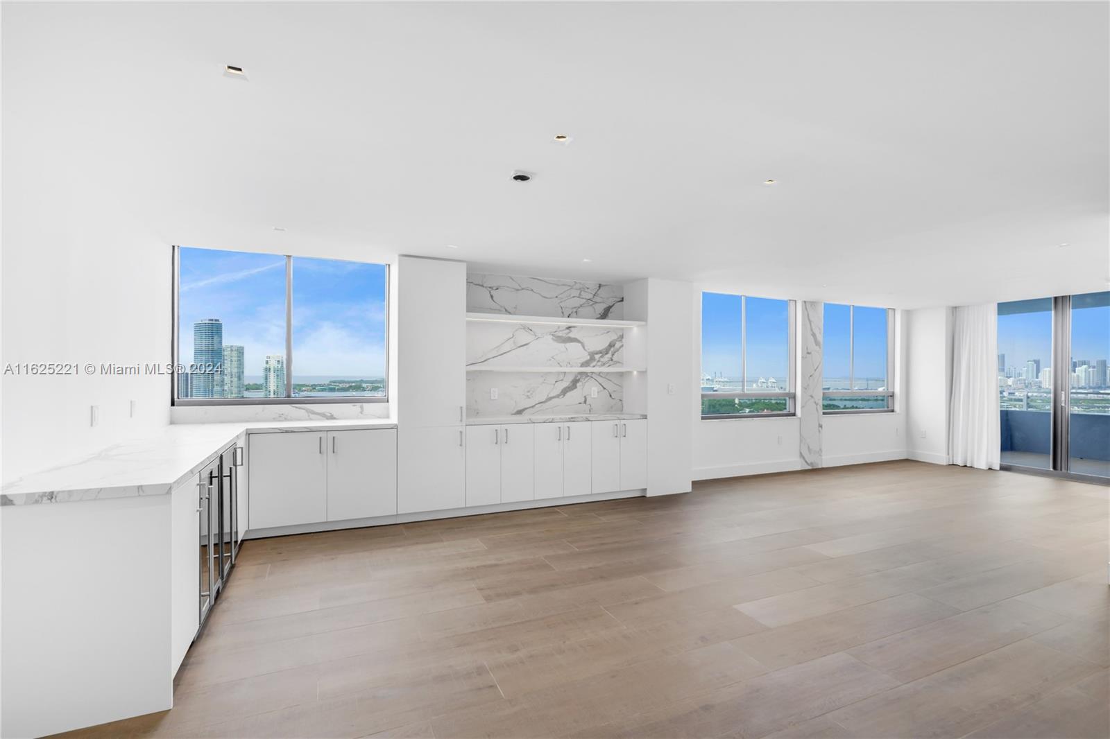 Brand new, turnkey gut renovated unit with direct downtown views at the Waverly South Beach. This is the largest line at the Waverly, huge open living room, wine fridge and 2 beverage centers. Lots of natural light, tons of storage and close space. Enjoy breathtaking sunset views over downtown and the bay, with exposures to the south and west from a high floor that also offers glimpses of the ocean. This exclusive 2-bedroom 2 bath unit includes 2 parking spaces. Tennis and volleyball courts, alongside a pristine pool, add to the allure of this prestigious building. Located a few blocks from Sunset Harbour, this is urban living at its finest.