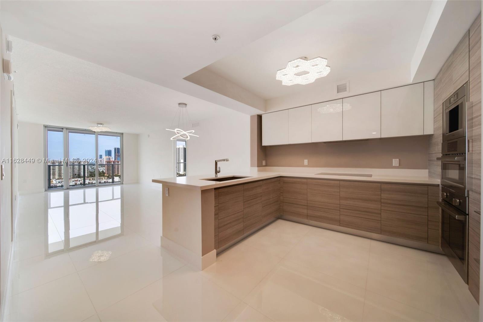 MUST see this 21st floor beautifully appointed 2 bed + Den / 3 bath luxury condo with 1,850 sq. ft. in Parque Towers. Large Den can be used as a 3rd Bedroom, State-of-the-art European high end kitchen appliances. Unobstructed EAST, NORTH & WEST views from 225 sq/ft balcony of the ocean, glamorous Sunny Isles Beach sky line and Intercostal views! Large Master Suite with separate soaking tub and shower. Amenities include: 24 hour lobby services & valet, 5 pools, fitness center, spa, cigar room & wine cellar, Kid's club, guest suites, lounge areas... Close to Aventura and Bal Harbour.