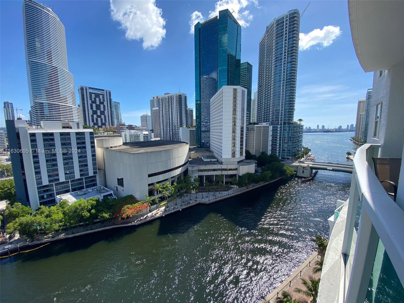 Discover the elegance of urban living at Brickell on the River North. This immaculate 2-bedroom, 2-bathroom condo offers stunning views of the river and Downtown Miami. Nestled in a luxury high-rise, the unit boasts modern finishes and ample natural light. Residents enjoy top-notch amenities, including a three-story fitness center, spa, swimming pool, clubroom, and business center. Located just steps from the MetroMover and Brickell City Centre, this peaceful retreat is perfect for those seeking both convenience and tranquility in the heart of Miami.