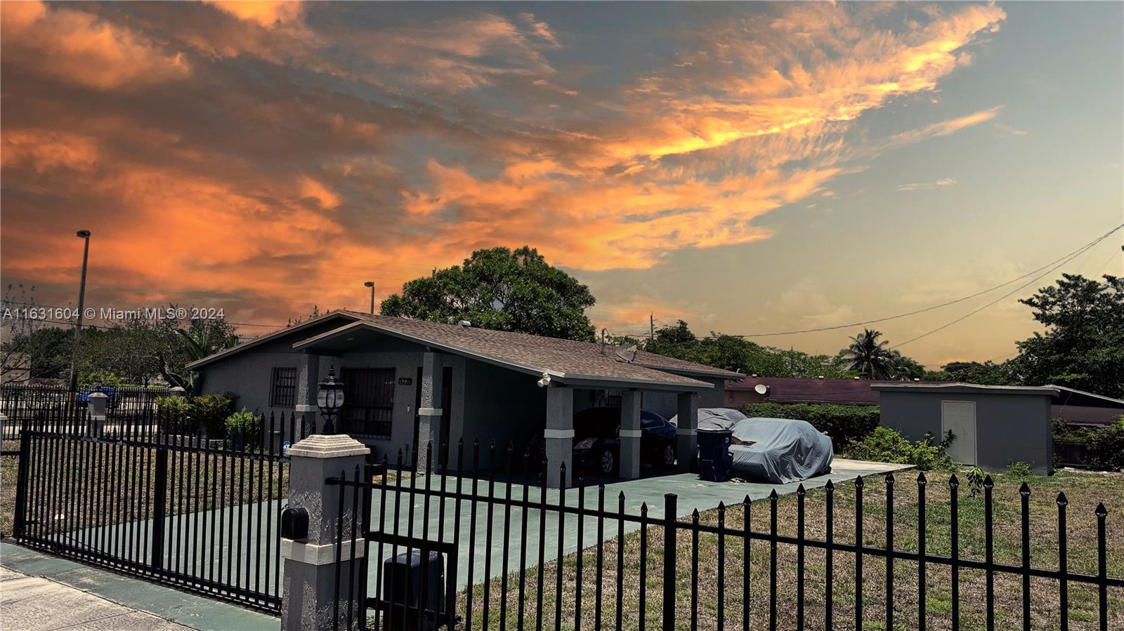 This charming single-family home, listed, features 3 bedrooms, 2 bathrooms, and 1,617 sq. ft. of living space on a spacious 10,000 sq. ft. lot. Built in 1961, the home offers a blend of comfort and convenience with a bright Florida room, modern kitchen appliances, and a mix of carpeted and ceramic floors. Enjoy the benefits of central cooling, electric heating, and an attached 2-car garage with additional parking in the circular driveway. Located in the desirable Carol City 4th Addition, this property is close to major highways, shopping, dining, and recreational facilities. With no HOA fees or pet restrictions, this home is perfect for families or investors. Schedule a viewing today and make this beautiful house your new home!