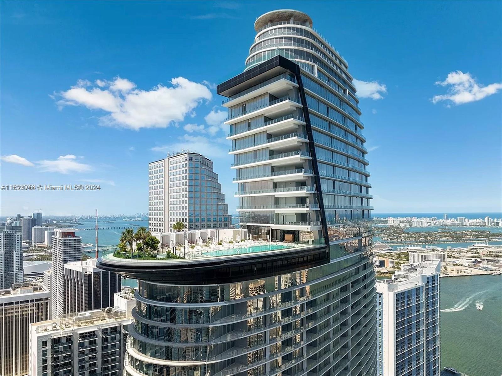 Stunning 2-bedroom, 3-bathroom + den unit boasting 1,829 square feet and an additional 278 square feet private exterior area, breathtaking unobstructed bay and city views through floor-to-ceiling windows bathing the space in natural light.

Situated in the iconic Aston Martin Building in the heart of the city, just minutes walk to Brickell and Downtowns finest restaurants and shops. This residence combines cutting-edge aesthetics with world class amenities where every detail reflects an architectural masterpiece.