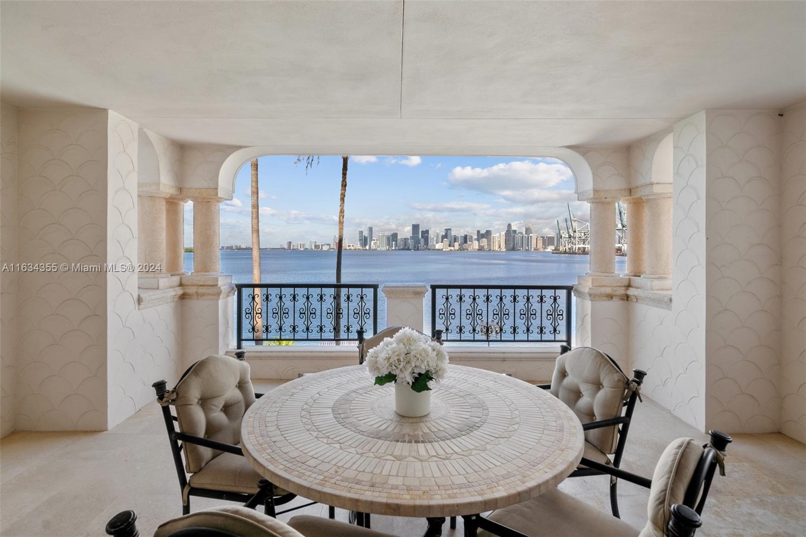 Pristine pied-a-mer, this spacious 2/2.5 unit has all the attributes of a luxuriously yet comfortable home away from home. Cozy living areas, sprawling master suite w/ double door entry. Entertain guests in the deep, wide terrace overlooking the Miami skyline & its mesmerizing sunsets. Second BR/guest suite has its own private entrance. Feat...Marble flooring throughout, huge private gated courtyard entry, breakfast room.