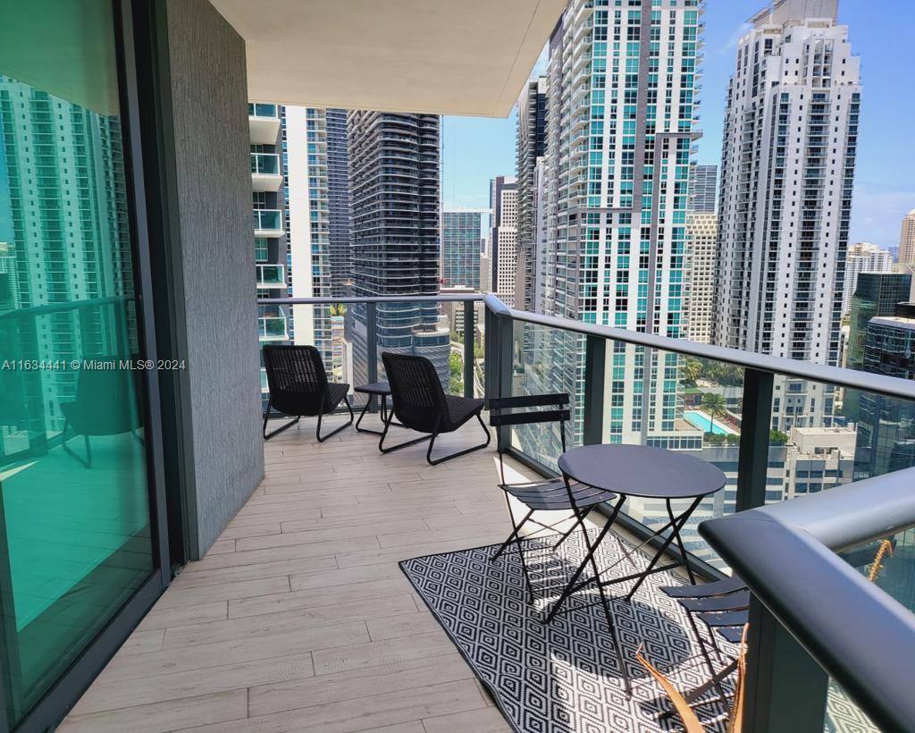 Welcome to Unit 2501 at SLS Brickell. 1,200 square feet boasting 2 bedrooms, 2 bathrooms, + a den. Fully furnished. Wrap-around balcony with access from every bedroom and living room with great views . Best restaurants, hotels, and spots in walking distance 1 assigned parking spot as well as wifi. TEXT LISTING AGENT