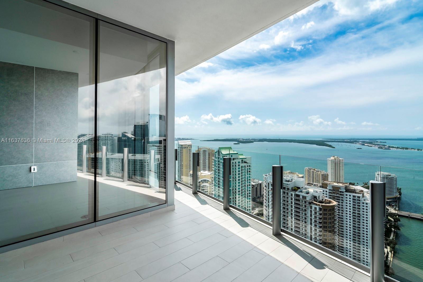 Experience luxury living in this brand new, never-lived-in unit at the prestigious Aston Martin Residences in Downtown Miami. This stunning 2-bedroom plus den, 3.5-bathroom residence epitomizes sophistication and elegance. The sleek architectural design reflects the iconic automotive brand’s style, enhanced by breathtaking views of Biscayne Bay and Miami Beach through floor-to-ceiling doors and from the expansive balcony. Enjoy the Sky Amenities level with its infinity pool, spa, private movie theater, and ultramodern gym. Inside, the unit showcases meticulous craftsmanship with a gourmet kitchen, Italian marble bathrooms, and expansive windows. This exclusive address offers a lifestyle of refined opulence and convenience, setting a new standard for high-rise living in Miami.