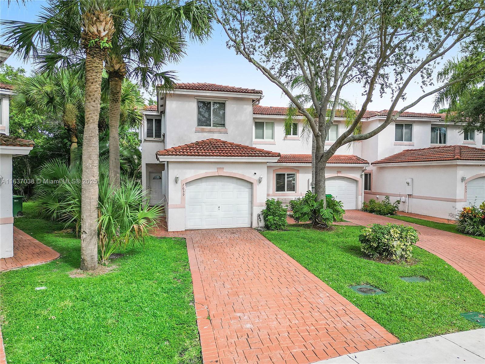 7659 Tamarac Island Circle, Tamarac, Florida image 1