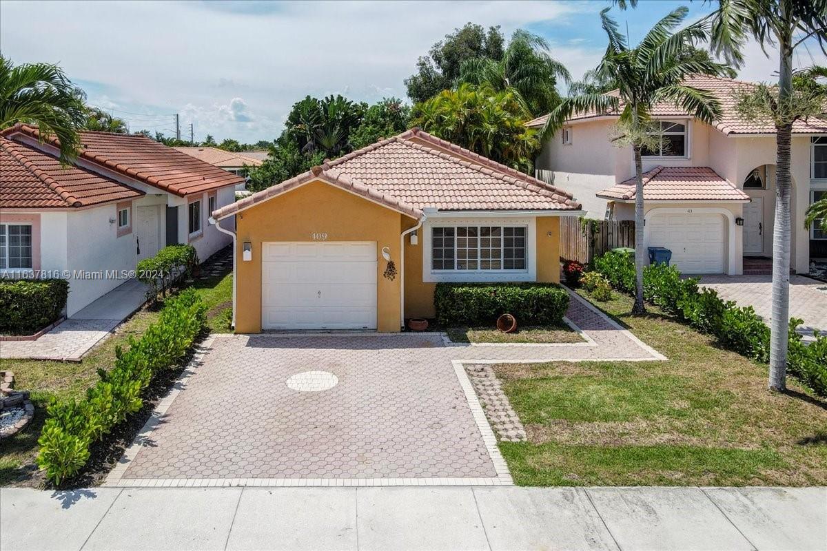 409 Kelly Ln, Weston, Florida image 1