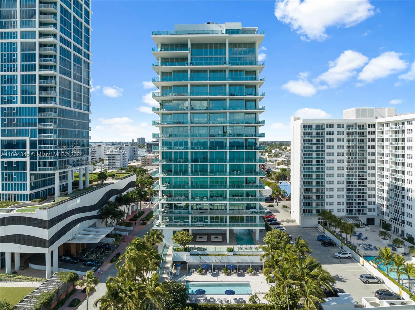 Beautiful corner half-floor residence at L'Atelier Boutique Building with only 25 residences in Miami Beach. L'Atelier common areas were designed and furnished by Holly Hunt. Enter through your private foyer to a flow thru residence with 3 bedrooms - 3.5 bathrooms and 10' ft ceilings. Enjoy Direct Ocean views and 2 expansive balconies with over 1,300 sq. ft. to entertain. Floor to ceiling windows, Italian kitchen by Poliform with Gaggenau appliances. L'Atelier offers 24hr valet, pool & beach attendant, oceanfront infinity pool, afternoon lap pool, cabanas, bar, hammock garden, spa with sauna & hammam and double height state-of-the-art gym. Terrace floor is finished, not shown in photos.