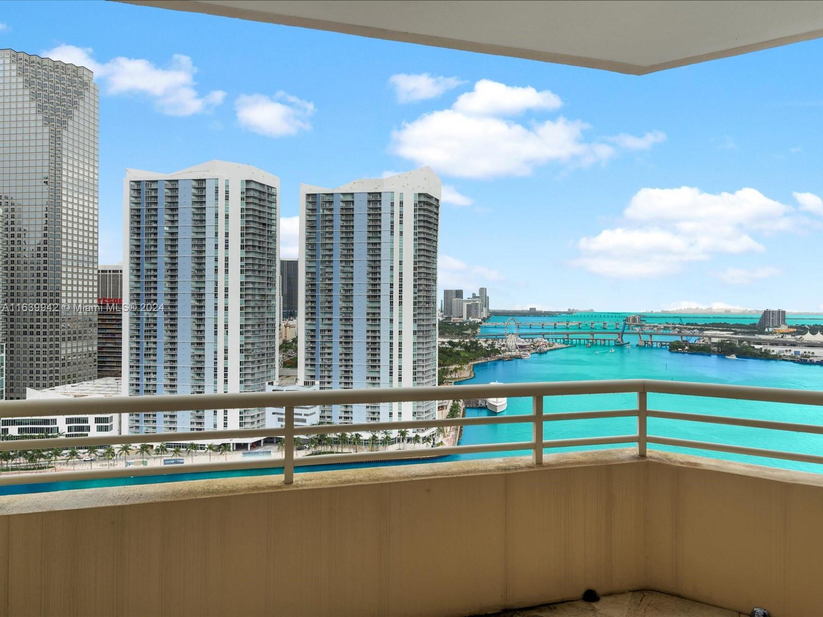 Experience Luxury Miami Living in Exclusive Brickell Key. Step into a world of luxury with this stunning 2-bedroom, 2-bathroom condo on the 25th floor of One Tequesta Point. This 1,310 sq. ft. residence offers breathtaking, uninterrupted views of the Miami River, Intercoastal Waterway, downtown Miami, and the iconic bridges connecting to Miami Beach. Enjoy watching cruise ships pass by, all from the comfort of your home, while the city’s fireworks light up the night sky. One Tequesta Point offers unparalleled privacy and security, with double security gates, 24/7 concierge, and valet service. The newly remodeled lobby and valet area complement the luxurious amenities that include a state-of-the-art gym, squash and racquetball courts, a pool, and a business center for added convenience.