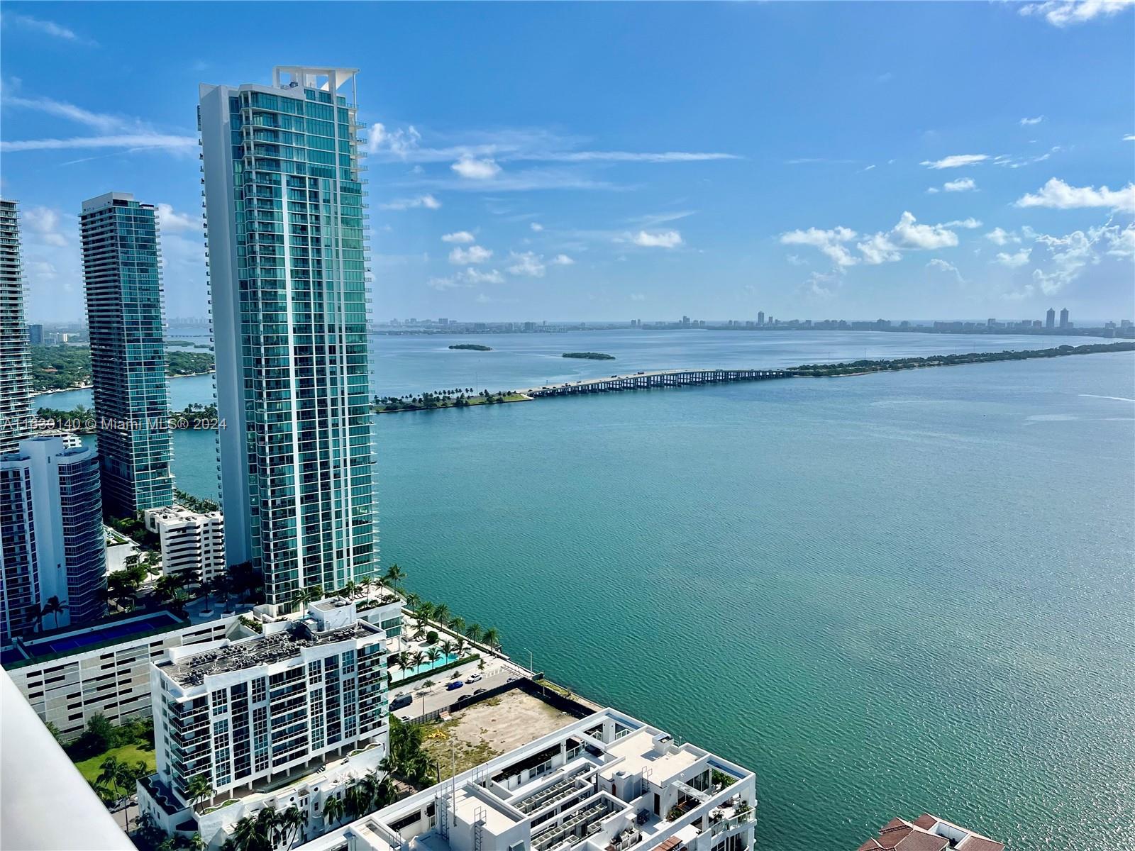 COME LIVE IN THE HEART OF EDGEWATER MIAMI .PANORAMIC DIRECT EAST BAY & OCEAN VIEWS FROM LIV/DIN/KIT/MASTER BEDROOM & SECOND BEDROOM. ITALIAN CABINETRY IN KITCHEN & BATHS. 10 FT CEILINGS & FLOOR-CEILING IMPACT WINDOWS. PRIVATE ELEVATOR. 1646 SQ FT OF AC SPACE + HUGE 7 FT DEEP BALCONY W/257SQ FT. SPECTACULAR TOTALLY FINISHED W/MODERN HIGH-END EVERYTHING. 2 PARKING + 1 STORAGE SPACE. FULL SERVICE BUILDING. WALK TO PARK, RESTAURANTS, CAFES, NIGHTLIFE, BANKS, PUBLIX & SO MUCH MORE...FIVE MINUTES TO BRICKELL, DOWNTOWN, WYNWOOD, MIDTOWN, THE DESIGN DISTRICT & MIAMI BEACH. EASY ACCESS TO ALL MAJOR HIGHWAYS. 24 HOURS TO SHOW!