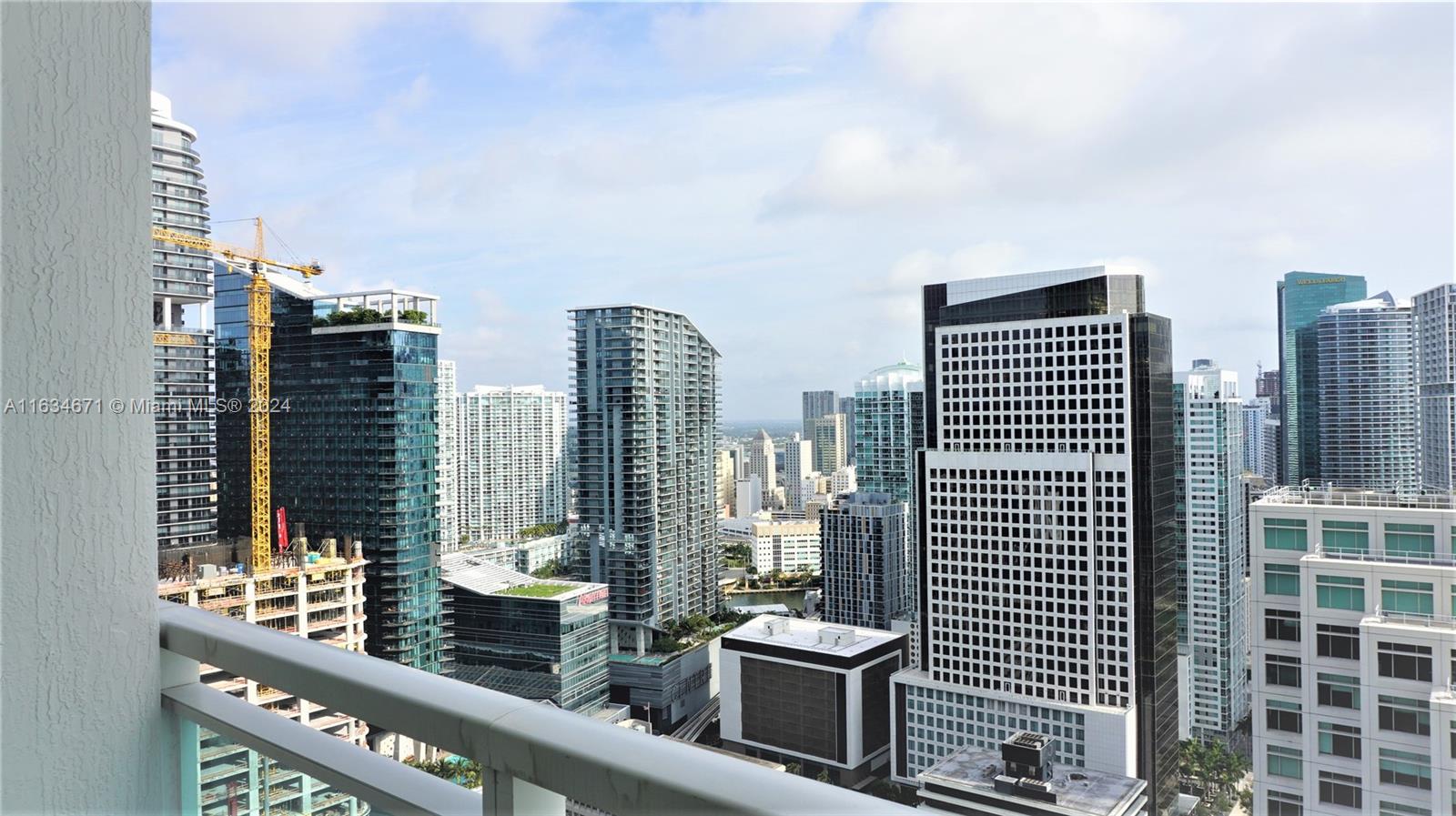 Priced to Sell! Perfect place to call home or exceptional investment property. Largest 1 BR line at The Plaza on Brickell with pool, bay, and city views. This corner unit is updated with designer upgrades. Laminate floor throughout the unit. Spa-inspired bathroom with high-end dual sink including shower! The bedroom has floor to ceiling windows and large walk-in closet. Granite counters and stainless steel appliances in the kitchen. The building has resort-like amenities including 2 large pools and jacuzzi, full gym with sauna, business center, theater room, and club room. HOA includes cable/internet, water, concierge, security, amenities, and unit structural insurance. The property has 1 original owner. Motivated seller that will consider all reasonable offers!