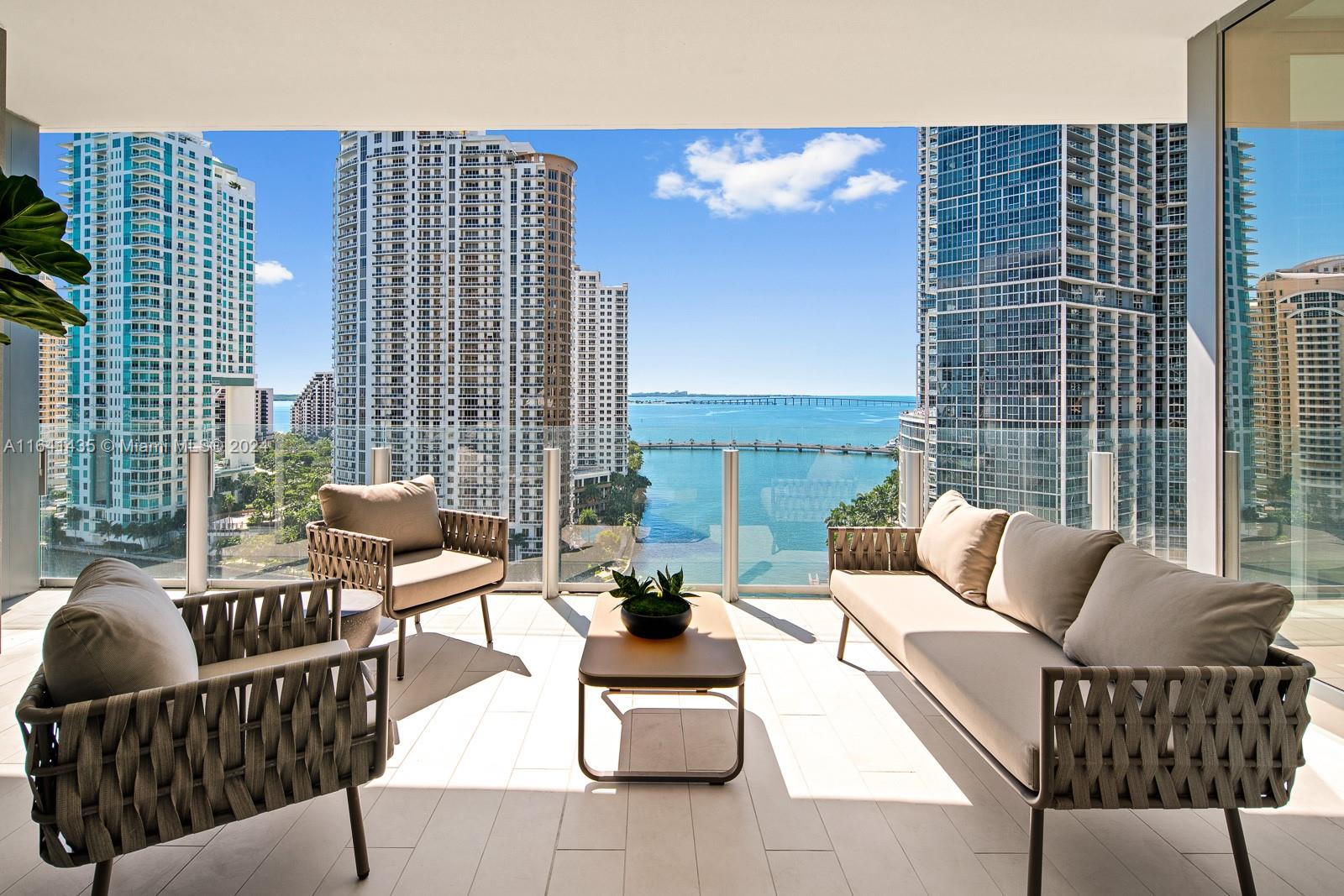 Discover luxury living in this stunning 15th-floor unit at the Aston Martin Residences. Spanning 3,075 sq ft, this residence features 3 bedrooms, a DEN, and 4.5 bathrooms + Staff room. The property is move-in ready, featuring fully installed curtains and completed closet installations. Enjoy breathtaking direct views of Biscayne Bay. This unit includes two parking spaces. The building offers over 42,000sqft of world-class amenities, including a swimming pool on the 55th floor, a state of the art gym, spa (his& hers), art gallery, 2 Movie theaters, golf practice area, grand community room, Kids room, Billards room, Aston Martin DBX house Car, valet parking, and concierge services. Ideally situated in Downtown Miami, this is an unparalleled opportunity for sophisticated living. Easy to show.