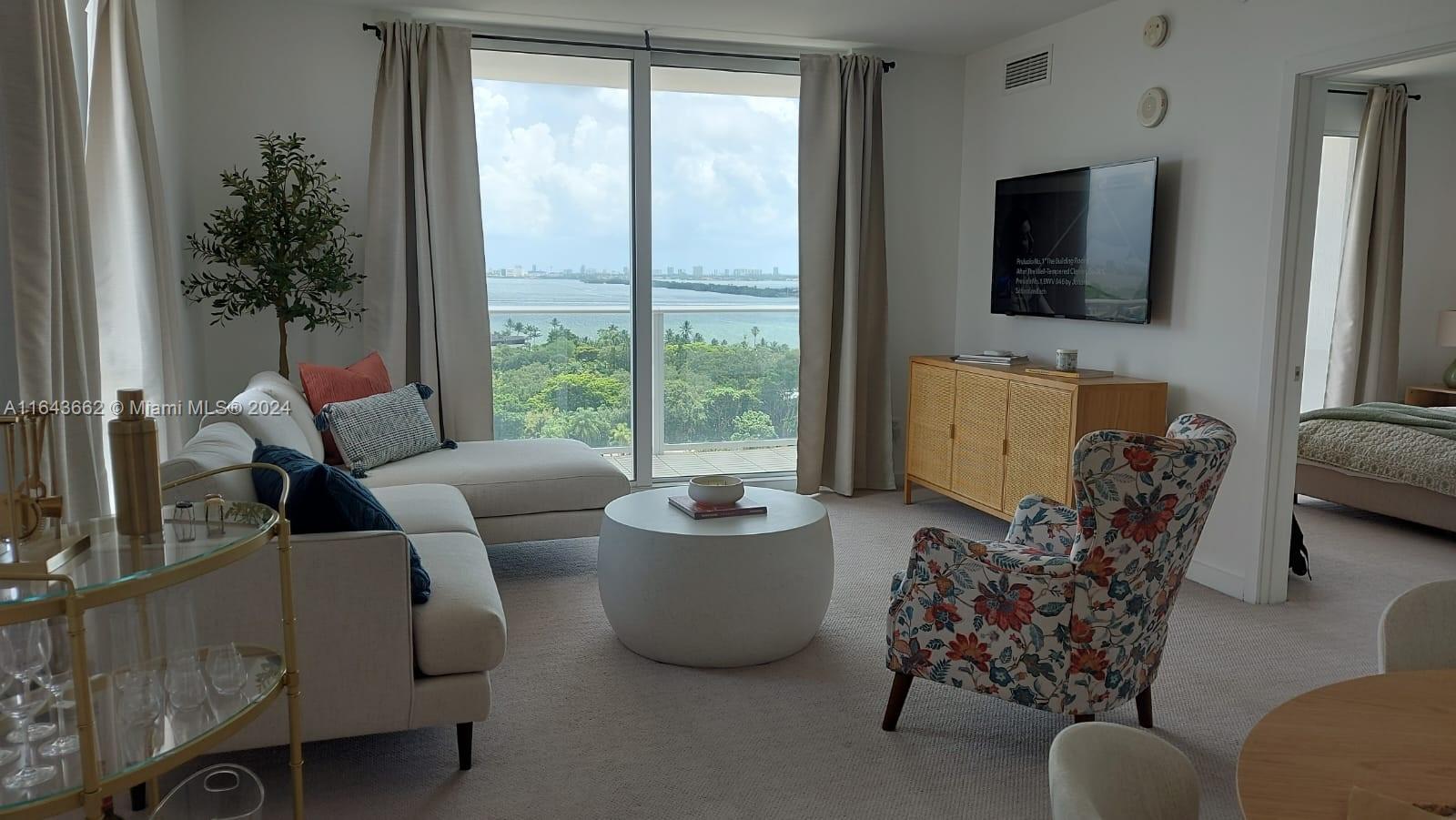 Beautiful Furnished 1 Bed plus Den + 1 bath, corner Unit, breathtaking views of Biscayne Bay & Bay Point. Luxury Condominium located 5 min from the Design District & Midtown; Baltus is a boutique building w/only 167 residences in 17 floors, Full amenities:World-class gym,55 foot long pool overlooking Biscayne Bay & Miami Beach,Hot Tube,Club House, Solarium on the roof top lounge & much more. 24 hours security,Walking distance to luxury shops & award winning restaurants, museums & galleries. NEW furnitures. Available January 10.