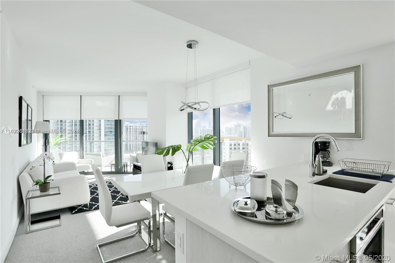 Beautiful Unit at Paraiso District! Fully furnished and equipped 2 Bedrooms + Den converted to Bedroom. Large corner balcony. Building has incredible amenities including a 46th floor rooftop with heated pool, spa, and BBQ area. Games room, screen room, party room, gym, and kids room. Valet Parking and Bellman Services. Available for short term rental minimum of 30 days. Available October 15th. Vacant Easy to show.