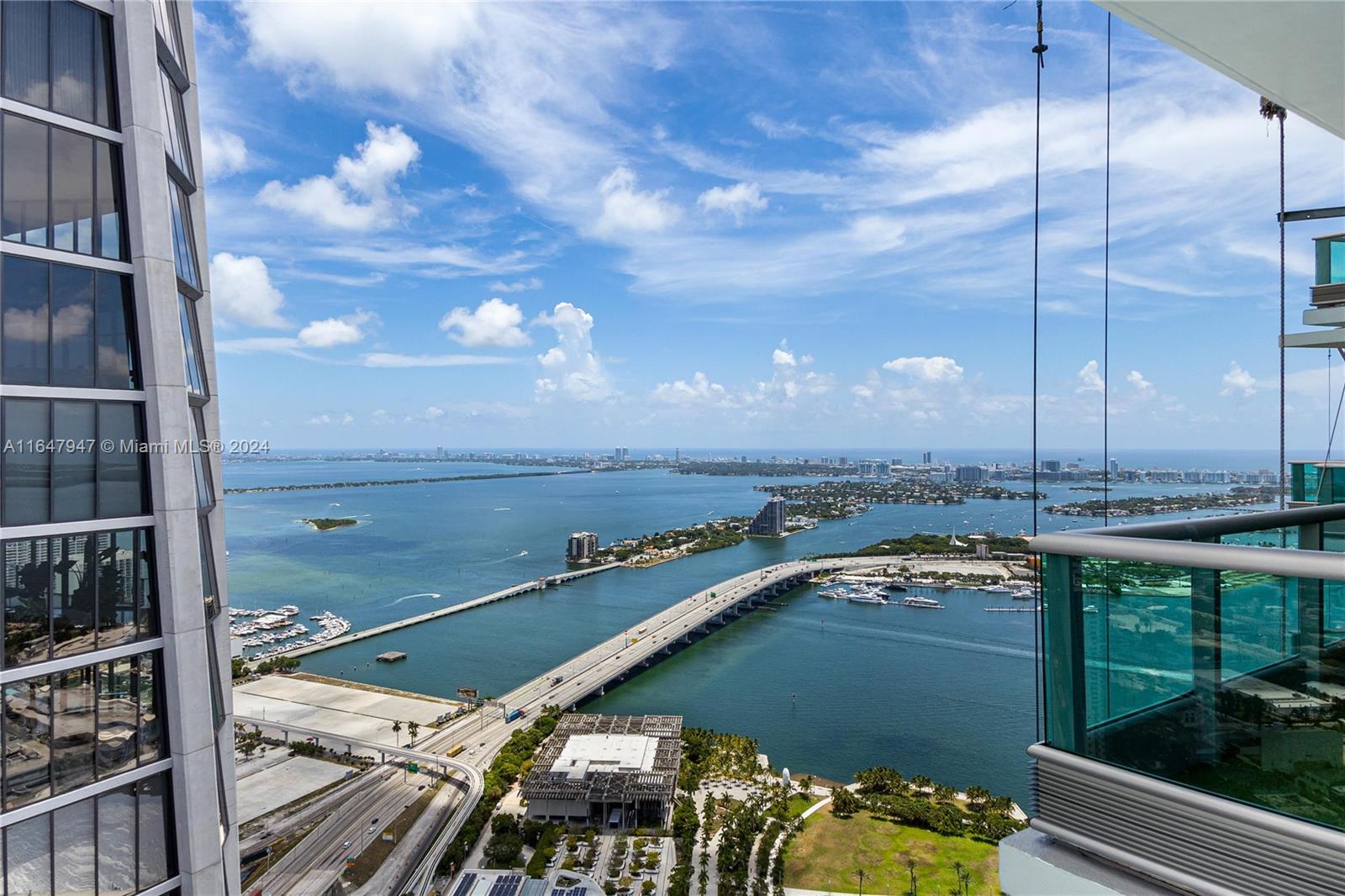 Live life at the top 63 Floors up! Rarely available top floor penthouse. Views from every bedroom; balconies in every room overlooking Biscayne Bay & the city skyline, perfect for sunsets/sunrises. 2,800+ interior sq ft. in Marble tile. Ultimate privacy: Private Elevator w/ double door entrance & Feng Shui water fall to greet you. Stylish modern furniture/art compliment the expansive floor plan. Open kitchen/living area for entertaining, top of the line appliances. Large master with tons of closet space. Too much to list, this is a must visit property. Amazing gym complex with spa, multiple swimming pools, business center, party room. Minutes from seaport, airport, cruise terminal, South Beach, Financial District, Arts/Cultural centers. Live downtown & be part of Miami's future today!