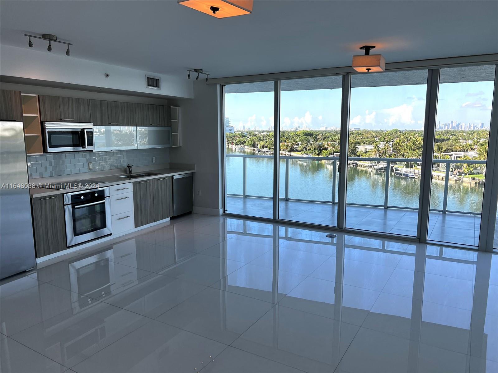 Experience breathtaking views of both the Bay and Intracoastal from this exceptional modern corner unit. This 3-bedroom residence, located in the boutique Eden House, is truly one-of-a-kind. With sleek, contemporary design and a prime location just steps from the beach, this home offers the perfect blend of luxury and convenience. Enjoy an array of top-notch amenities in this exclusive building. A must-see to truly appreciate its magnificence!