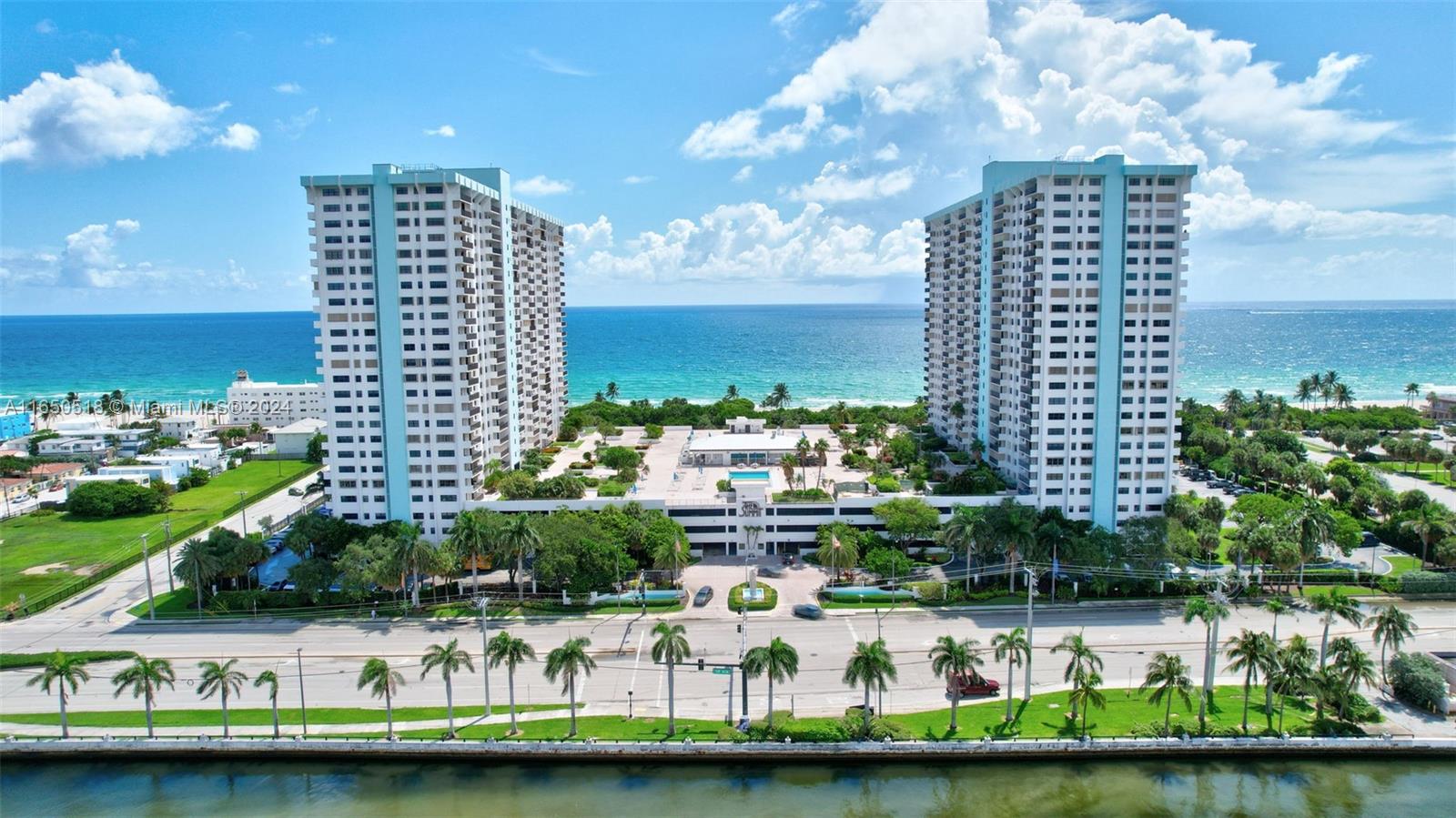 Rare Opportunity! This highly sought-after Line 11 unit at the Summit Condo Complex offers unparalleled views and convenience. Located in the most desirable line of the South Building, this 2-bed, 2-bath corner unit is in perfect move-in condition. It boasts breathtaking views of the ocean, Intracoastal, and South Lake. Key features include marble floors, updated bathrooms, a newly renovated kitchen with granite countertops, in-unit laundry, and two parking spaces. The building provides 24-hour security, garage and guest parking, two heated pools, a restaurant, BBQ area, tennis courts, a gym, and more. Situated on a 6.6-acre waterfront tropical garden, it’s just steps from the famous Hollywood Broadwalk and close to shopping, dining, bars, and a casino. This rare find is a must-see!