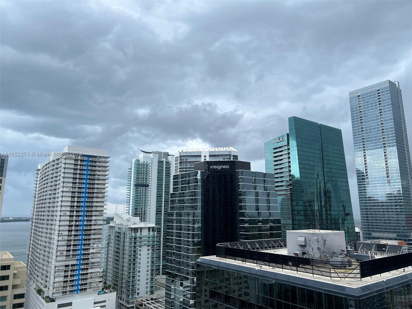 ONE OF THE BEST UNITS WITH BAYVIEWS, THE BOND IN BRICKELL. With THE BRITISH GLAMOUR. OFFERING 1+Den BEDROOMS AND 1.5 BATHS, LARGE MASTER CLOSET, PORCELANATO FLOORS, BUILDING INCLUDE: POOL AREA WITH BBQ STATIONS, GYM, CHILDREN'S ROOM, GROUND LEVEL RETAIL, 1 PARKING SPACE( 231 ). ** COURTAINS & LIGHTS ** IN .BEDROOM. & LIVING ROOM.