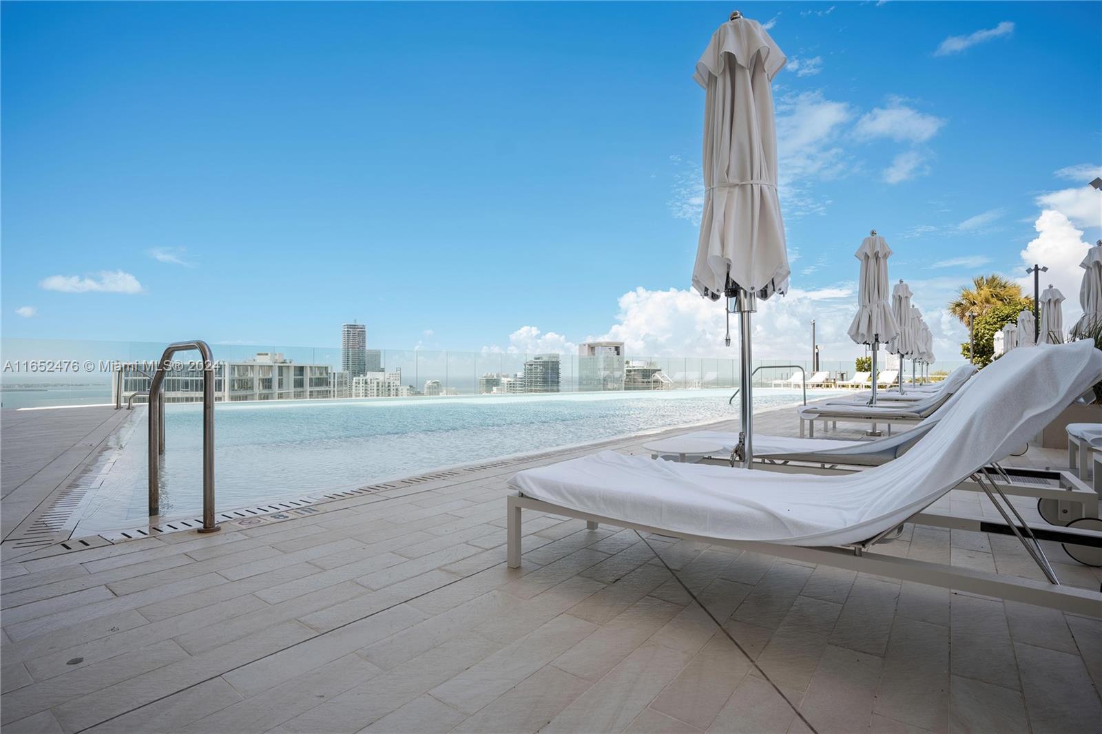 Introducing Aston Martin Residences, a bespoke new construction offering an unparalleled living experience in the heart of Downtown Miami. This residence is designed for those who appreciate the finest in elegance and comfort. The state-of-the-art kitchen features Bulthaup cabinetry and Gaggenau appliances, complemented by European cabinetry and premium marble flooring in the bathrooms. Residents can indulge in 4000 sqft a wealth of amenities, including a cutting-edge fitness center, a serene spa, an expansive pool deck, stylish salons, inviting lounges, and a private marina, with the most amazing views of the city Every detail of the project has been meticulously designed to offer a truly luxurious lifestyle.