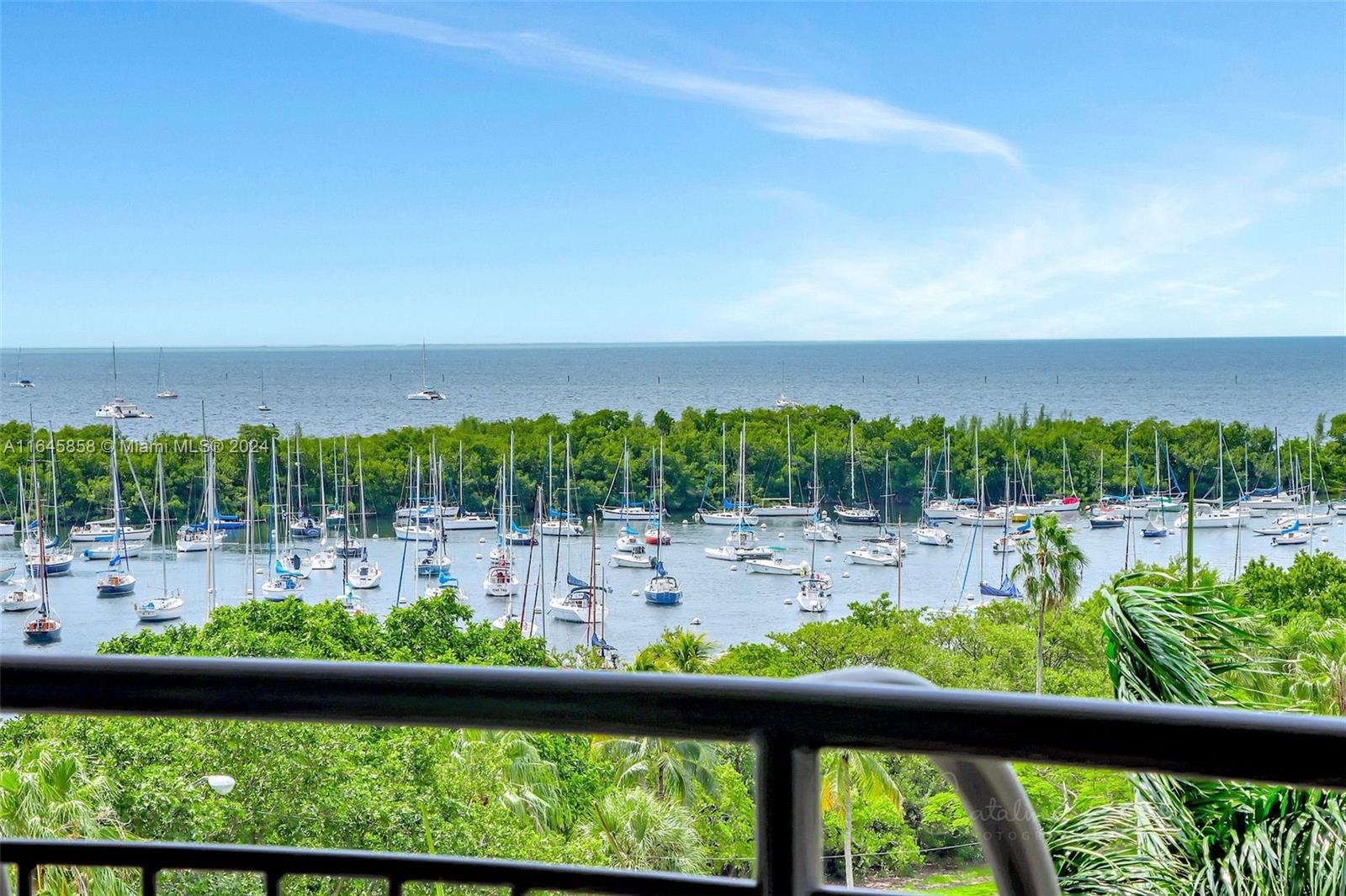 Grove Towers is located in the heart of Coconut Grove, one of Miami's most desirable neighborhoods, lined by Sailboat Bay on prime South Bayshore Drive. This spacious 2 bedroom, 2 bathroom residence offers views of the Bay, bobbing sailboats, and Coconut Grove's Skyline. Just downstairs you can stroll to everything you need including Marinas, Parks, Shopping, Restaurants, Coffee Shops, Movie-theater, Fresh Market and much more. With a 1,375 SF interior floor plan plus 2 huge balconies, you can make this your dream home in the sky. Amenities include Front Desk Concierge, On Site Property Manager, Valet, Tennis/pickleball, Heated Pool, a modern Gym & more. The association is in its final stage of completing their 40-year certification with assessment fully paid off by seller. EASY TO SHOW!