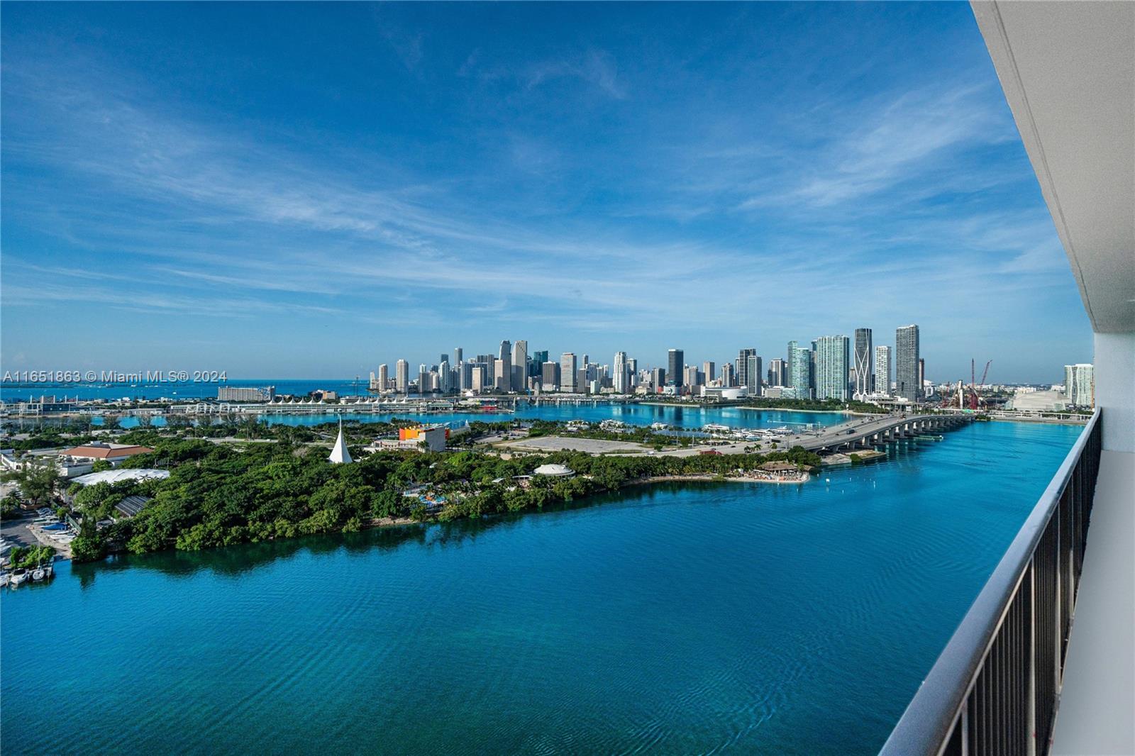 The most spectacular panoramic views of Biscayne Bay, Miami Beach & the downtown skyline from this rarely available upper penthouse at 1000 Venetian. This full-floor penthouse in the desired east tower offers 4,210 sq/ft under A/C, surrounded by 9+ foot-tall walls of impact glass doors leading to an additional 1,685 sq/ft of terrace space that is perfect for entertaining. (sq/ft per appraiser) The apartment has South, East & North exposures, with all rooms opening directly to oversized terraces with serene sunrises and unobstructed water views in every direction. All windows and doors have been replaced with hurricane impact glass. This 5bed/5.5bath is a unique opportunity to customize a large penthouse with the most amazing views in town, on the red-hot Venetian Islands! Easy to show.