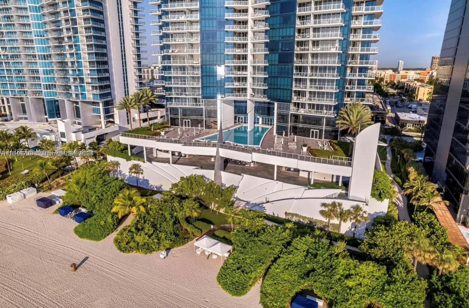 Enjoy the serenity and breathtaking views from this 2 bedroom plus den residence located inside the magnificent 52 story all glass high rise designed by award- winning architect Carlos Ott. Direct Ocean views.