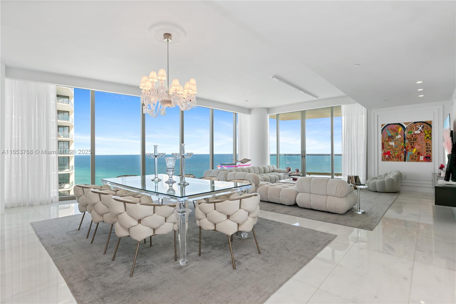 Miami art-deco meets modern luxury at this spectacular true 4-bedroom corner residence! Designed and decorated to the nines with the finest finishes that feature genuine white marble floors, elegant wainscot-walls, onyx primary bathroom overlooking the sea, chef’s kitchen with La Cornue gas range, two expansive terraces complete with outdoor summer kitchen, and complete smart home automation. European furnishings and Baccarat chandeliers are negotiable. The Estates at Acqualina is bar-none, Miami's premier luxury lifestyle property. Services and amenities feature Rolls Royce House Cars, 5 world-class restaurants including Avra, Il Mulino, Keuh, Costa Grill and Toscana, 3 pools with SurfRider/slide, daily breakfast, cinema, skating rink, bowling, F1, golf simulator and basketball court!
