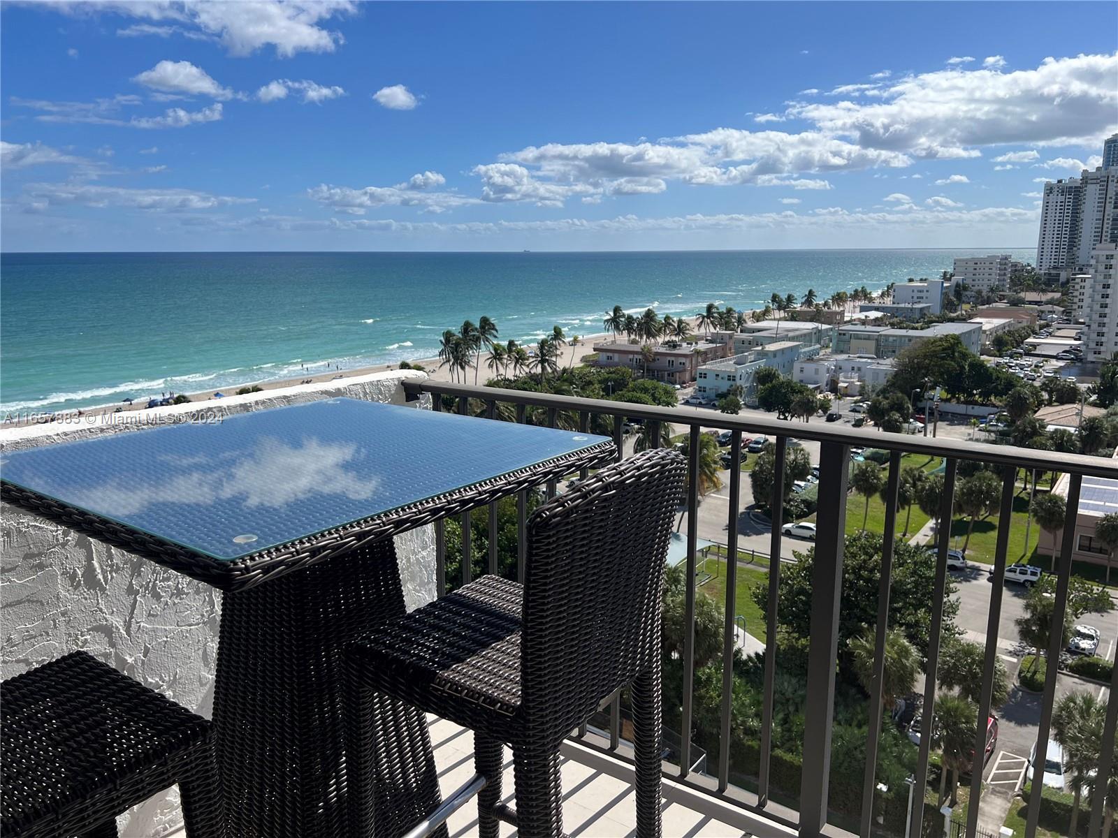 Discover this beautifully remodeled beachfront condo in Hollywood Beach with stunning ocean and canal views! This 2-bedroom, 2-bathroom home has been transformed with modern finishes, offering a perfect balance of style and comfort. The open-concept design allows natural light to fill the space, offering ocean views from every room. Both bedrooms are tranquil retreats, and the condo features a gourmet kitchen, walk-in closets, and a seamless layout. Summit Towers is the first condo on the beach to connect with the Hollywood Broadwalk. Enjoy two pools, a restaurant, tennis and basketball courts, a fitness center, and more. Just steps from the Broadwalk, restaurants, and shops.