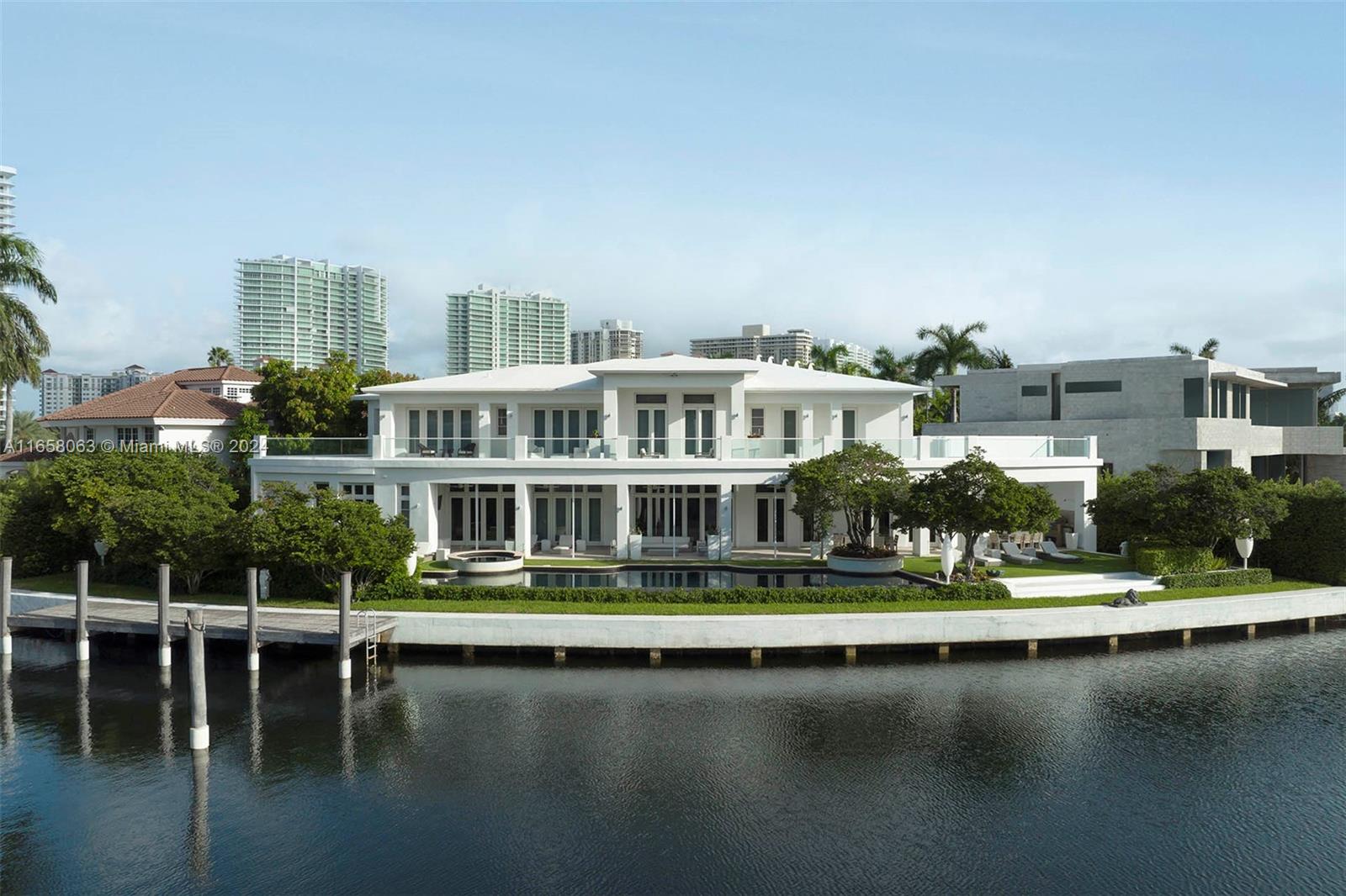 Nestled in the heart of the exclusive Golden Beach community, 142 S. Island Drive encompasses 0.41 acres+/- of
waterfront land with manicured exteriors, a private dock, and an expansive modern home. This residence boasts
sweeping Intracoastal vistas and 11,337 SF+/- of living space with 6 bedrooms, 8 full and 1 half bathrooms,
representing an incredible opportunity to take in the exquisite atmosphere of Golden Beach or set off via boat to
visit the community’s private shore and nearby cultural centers.