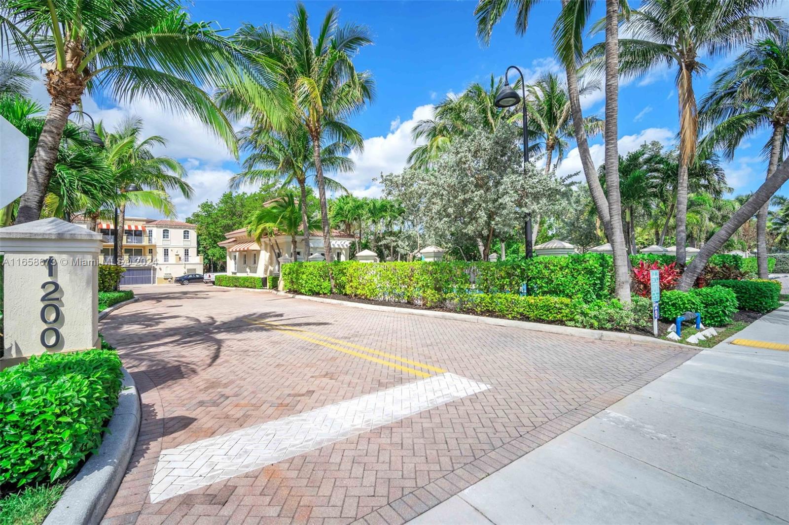 MOTIVATED SELLER - This Mediterranean-Style condo Located on the INTRACOASTAL offers direct access to a PRIVATE BEACH across the street. Situated on the famous Hillsboro Mile, aka "millionaire's mile". It's the ideal setting for stunning sunrises & sunsets. Floor-to-ceiling impact doors & windows, this unit has a contemporary kitchen that flows into the living area. Additionally, it offers a spacious lanai & towering palm trees for utmost privacy. Conveniently located BIKING DISTANCE of Deerfield, Pompano, this condo offers easy access to ENDLESS BEACHES, Deerfield Pier, restaurants, and entertainment. Enjoy a range of amenities on both the OCEAN and COASTAL sides, including a DOCK for boat pick up & drop offs, garage parking, PET-FRIENDLY, and NO RENTAL RESTRICTIONS. NEW ROOF COMING SOON!