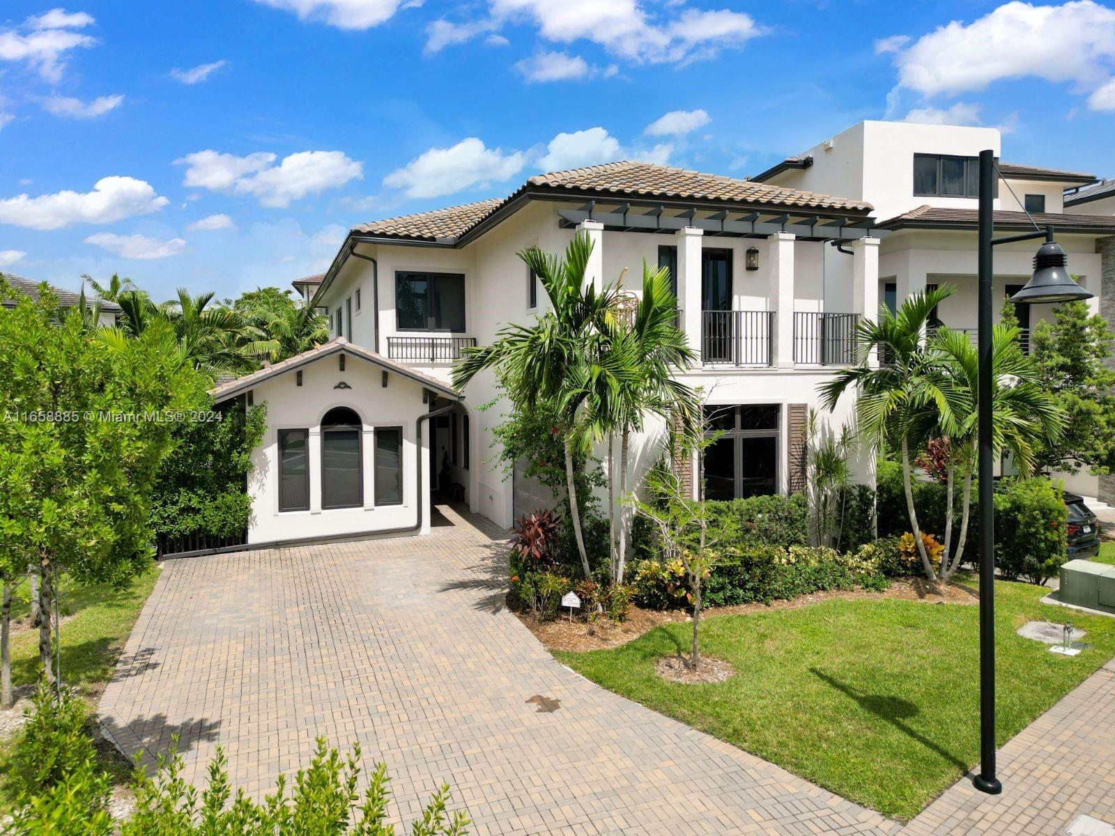 Elegant 5 bedrooms/5 baths corner single family home in the desirable community of Canarias at Doral one of the most sought-after neighborhoods. Home features an abundance of natural light, vaulted ceilings, fabulous formal dining room, chefs cooking island, quartz countertops & backsplash, Subzero & Wolf appliances, wine coolers, 3 A/C units & gutters. Perfect home for entertaining w/several unique one of a kind upgrades. Impact windows, wood floors, recessed lighting, ample of storage, oversize master w/sitting area for your private oasis, loft w/wet bar & so much more. One of a kind 9,597 sq ft OVERSIZE lot in Doral w/pool outdoor kitchen, beautiful landscaping & privacy fence. Resort style amenities within walking distance. Easy access to highways, schools, supermarket, & PASEO strip.