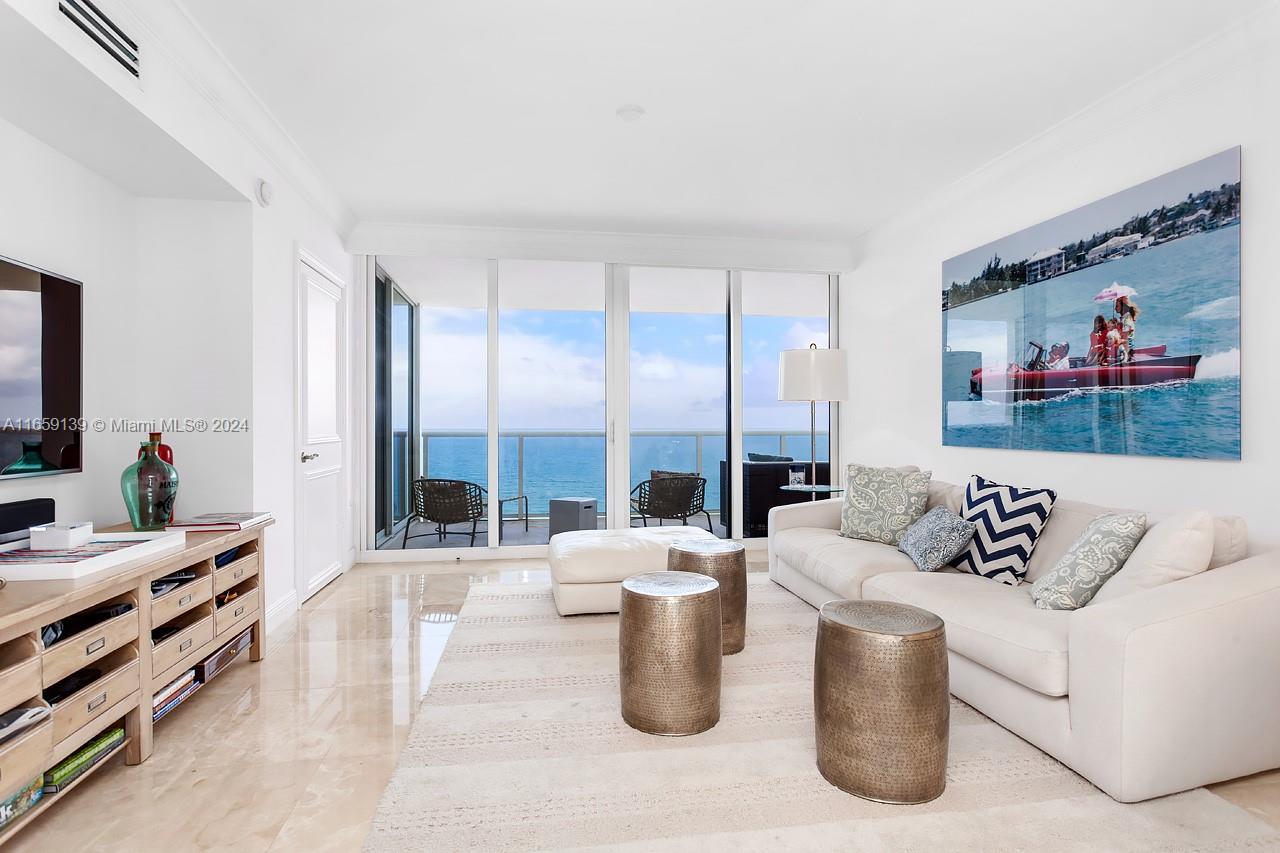 Experience the ultimate in seasonal living with this stunning rental boasting over 2,000 sq. ft. of luxurious space. This unit offers 3 spacious bedrooms, 4 elegant bathrooms, a private foyer entry, and a formal dining room. Enjoy ample storage with walk-in closets and the convenience of a separate laundry room. Revel in breathtaking, direct ocean views from the comfort of your home. The building's premier amenities include: Concierge, 24-hour security and valet, pool and beach services, two tennis courts, on-site restaurant, children's playroom, spa with sauna and steam rooms, massage room, billiard room, expansive two-story gym, & dog park. Conveniently located, this rental is adjacent to shops, restaurants, and parks, making it the perfect retreat for a season of comfort and luxury.