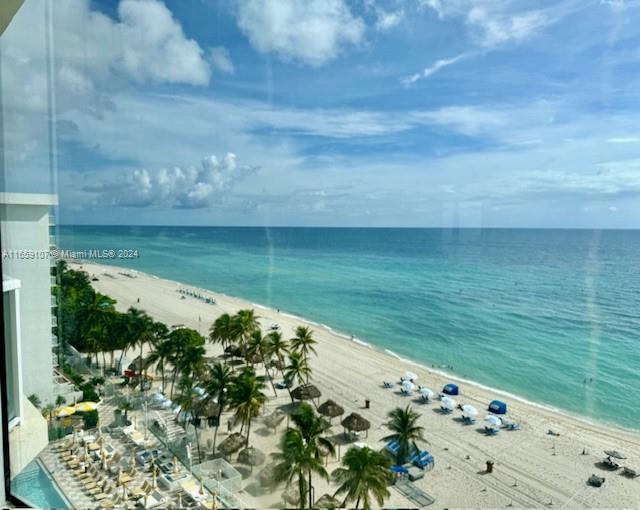 Discover luxury living in this beautiful condo in the La Perla building on Sunny Isles Beach. This spacious unit on the 10th floor offers breathtaking direct ocean views from the living room and bedroom and a private balcony. The living and dining areas have floor-to-ceiling windows, filling the space with natural light. The kitchen has stainless steel appliances and granite countertops. The balcony is perfect for relaxing while taking panoramic views of the Atlantic Ocean. La Perla offers 24-hour security, valet parking, a state-of-the-art fitness center, a heated pool, a hot tub, beach service, and more. Prime Location: Steps away from the beach, parks, shops, and dining. This condo offers the best of South Florida living, and don't miss out on this opportunity to live in paradise!