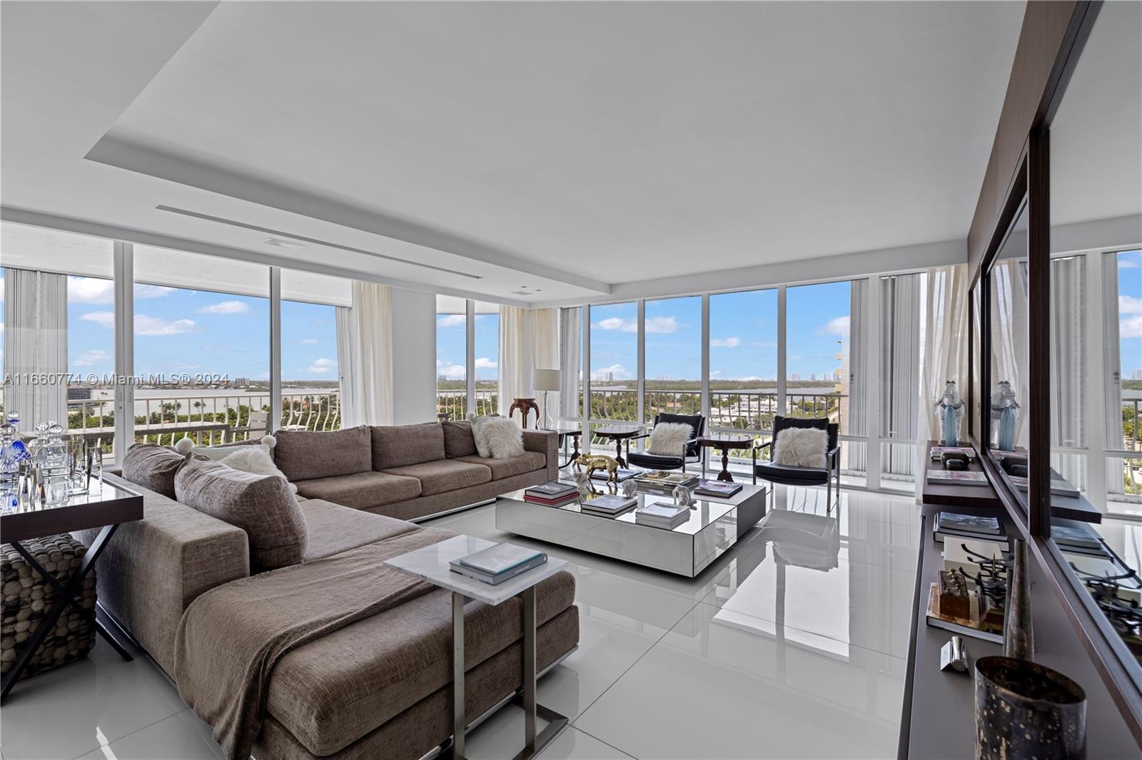 This fully renovated Bal Harbour apartment offers a spacious living space of 3,300 square feet. With 5 bedrooms and 5 bathrooms, a large dining area, and a comfortable living room, you'll have ample room to enjoy the luxurious atmosphere. The building itself is equipped with fantastic amenities, including a pool, and a "cabana" is available for rent. The apartment boasts breathtaking views from its elevated position, providing unobstructed panoramic vistas of the bay and city. The building also features a health spa, a fully equipped gym, an elegant restaurant, and a tennis court. Plus, it's conveniently located within walking distance of the renowned Bal Harbour Shops. This Bal Harbour apartment truly offers a home in the sky with all the luxury and convenience you could
desire.