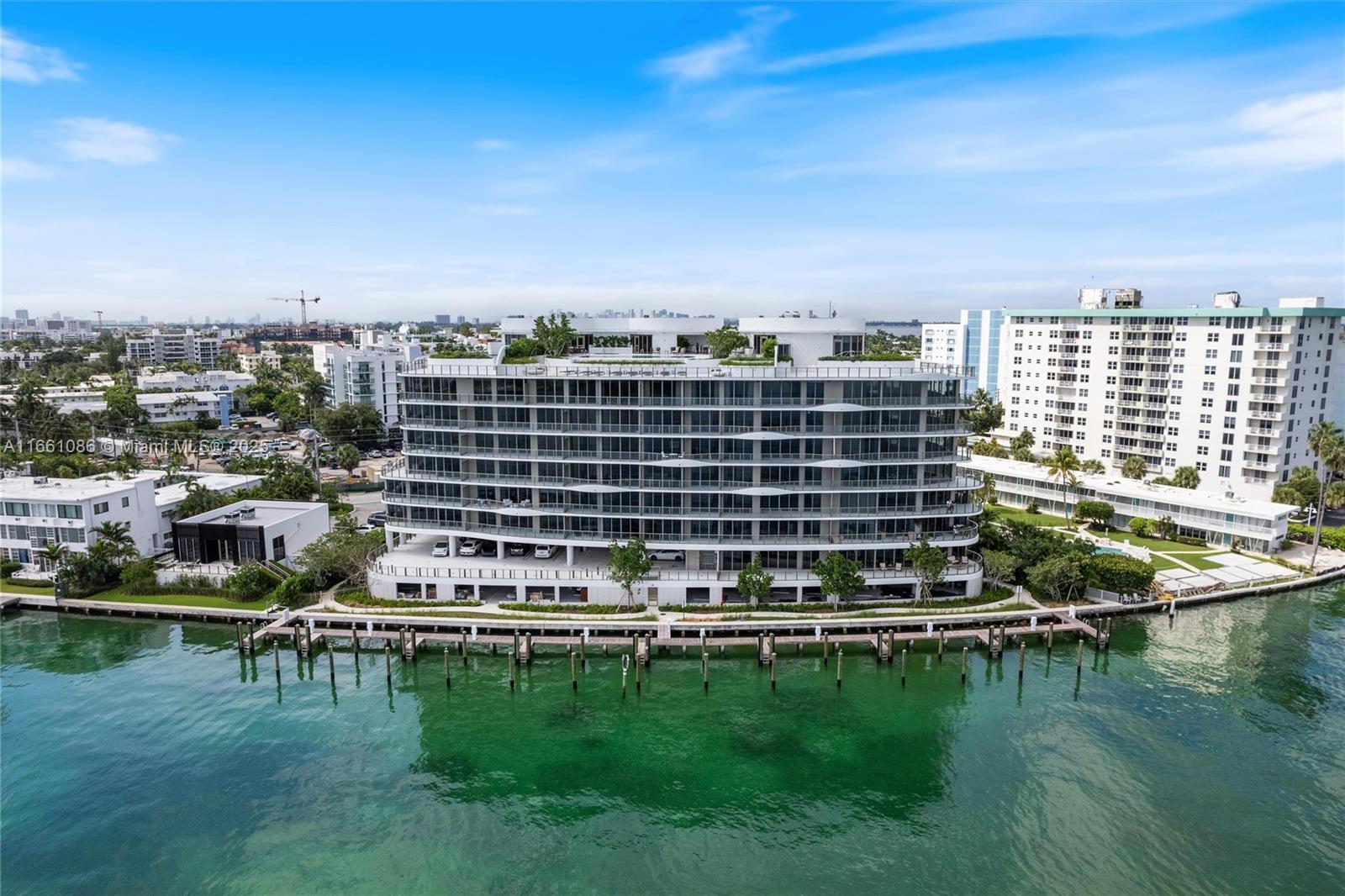 Unit 203 at brand new Onda Residences in Bay Harbor Islands is an elegant 3 bedroom, 3.5-bathroom plus den home with 2,333 sq. ft. of living space. Designed with exquisite Italian craftsmanship, it features Snaidero cabinetry, Miele appliances, and marble bathrooms, Italian porcelain flooring throughout. The unit boasts high ceilings with large sun-drenched windows and an open floor plan. 
Onda provides residents with exceptional services and amenities, including a rooftop pool and jacuzzi, a private marina, a state-of-the-art gym and spa with steam and sauna, 24-hour valet and security, personalized concierge services, and secured residential storage. The building also offers electric vehicle charging stations. Walking distance to world renowned Bal Harbour Shops and beaches!