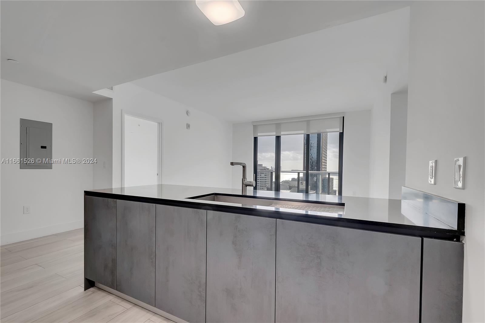 Enjoy the comfort of living in this spacious 2 BR + 3 BA that features an in-unit private elevator, 9-ft high ceilings, & floor-to-ceiling windows. 2 showers + 1 bathtub. In-unit W/D. Enjoy the skyline & partial bay views from the two in-unit balconies. 1010 BRICKELL is among the most amenitized buildings in Miami: rooftop pool & lounge, indoor poor, outdoor track, fitness center, indoor basketball/racquetball courts, kids playroom, game room, virtual golf, BBQ area, & spa. Located in the heart of Brickell - walking distance to the Metromover (public transportation), restaurant & shops, Brickell City Centre, & Mary Brickell Village. Short drive to Miami Beach, Key Biscayne, Coconut Grove, Downtown Miami, Wynwood/Midtown, & Design District.