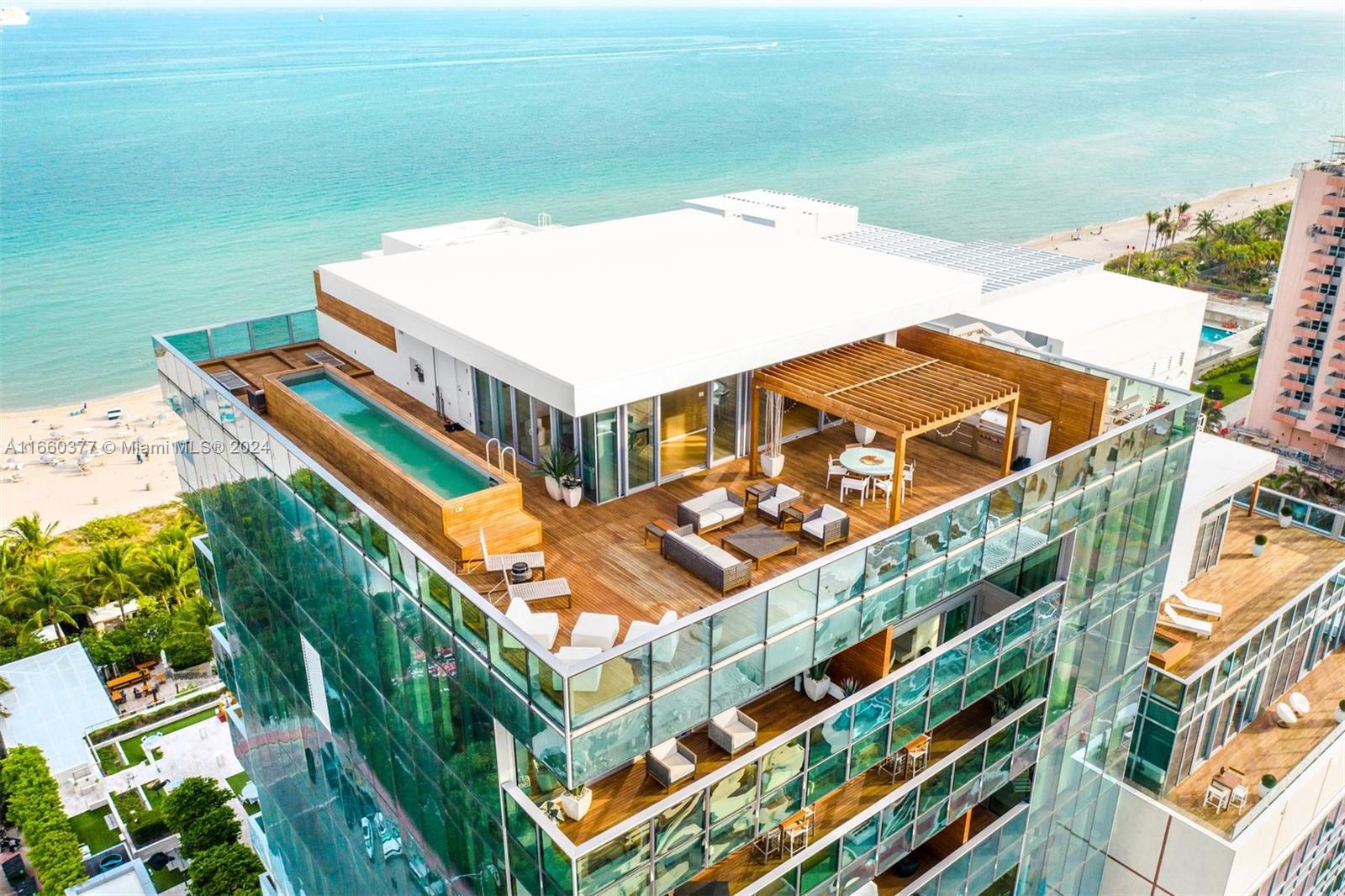 Enjoy breathtaking direct ocean and sunset views in this spectacular triplex penthouse with over 5,200 SF. Situated atop The Miami Beach Edition, this residence boasts 20ft floor to ceiling glass, a private rooftop with outdoor summer kitchen & a 36ft. rooftop swimming pool. The main level terrace runs along the entire length of the first floor. Custom kitchen by Bulthaup w/ Gaggenau & Subzero. Formal dining room, cozy family room, and elegant
junior master suite w/ envious views. The second floor has two guest suites and a primary suite with its own sitting
area, fireplace, & private balcony. The Master includes a his & hers steam shower & freestanding soaking tub
overlooking the ocean. Enjoy access to all the services & amenities at the Edition. Available starting April 1, 2025.