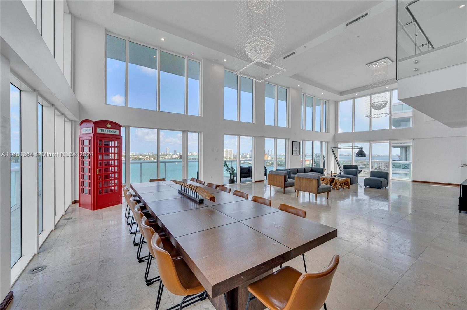 This spacious 4-bedroom, 3.5-bathroom, two-story loft offers 4,477 sq ft of living space with modern finishes and stunning open water views. The building is a waterfront modern gem located in the heart of Miami Bay, North Bay Village, and features just 15 exclusive two-story units, including a spectacular penthouse with panoramic views of Biscayne Bay.

North Bay Village is quickly becoming a sought-after location, with new developments like the Ritz Carlton Residences arriving next door. Each unit in the building features floor-to-ceiling windows, soaring 20-foot ceilings, and breathtaking water views. The property includes 34 covered parking spaces, two elevators, and excellent amenities like a gym, pool, and sauna for comfortable, upscale living.