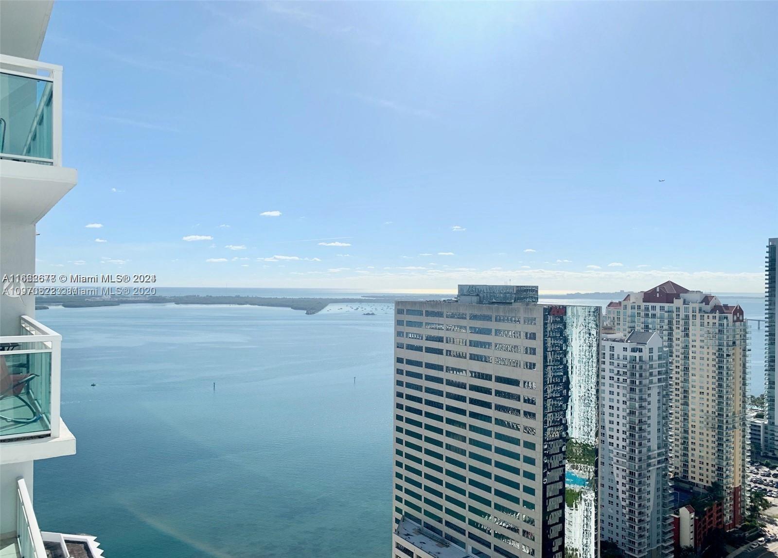 Enjoy the breathtaking views of Biscayne Bay from this elegantly renovated 2-bedroom, 2-bath residence at the prestigious Plaza on Brickell. Unit #3807 boasts exquisite porcelain tile floors, a functional kitchen peninsula which provides ample countertop space and a dining area, hardwood kitchen cabinets and stainless steel appliances. The thoughtfully designed split bedroom floor plan ensures privacy and comfort.  The Plaza on Brickell is celebrated for its exceptional amenities, including a 24-hour concierge, valet services, a state-of-the-art gym, two expansive pool areas, a movie theater, and a business center, offering a truly luxurious lifestyle. Please note that the balcony is closed until December due to a restoration project.