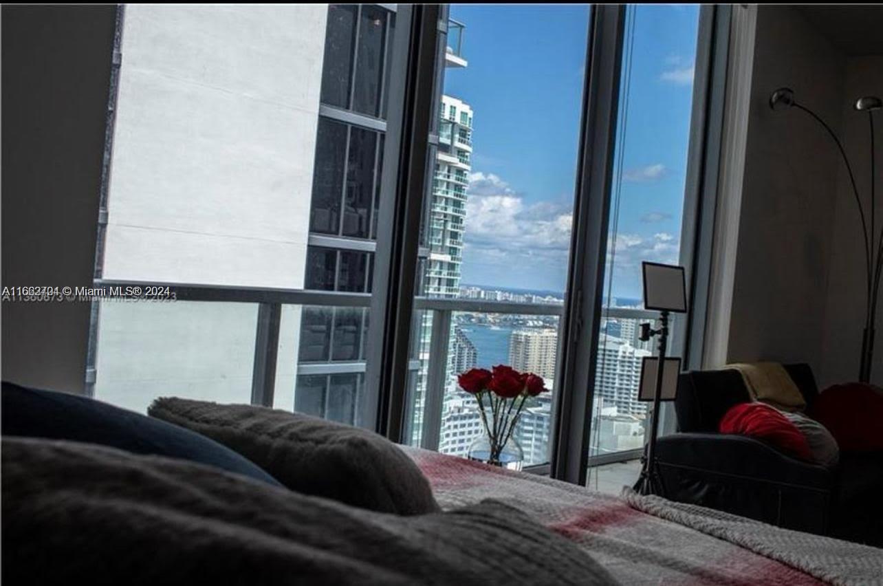 Wake up to water view from your bed in arguably Brickell's best building due to its atmosphere and location, with direct access to both Brickell ave, miami ave and best of all -the metro mover- for easy access and CarFreecommute. This chic and modern building exudes the best of downtown life, coupled with state of the art Gym,virtual Golf, yoga room, business center, resort style pool and 5 star rated restaurants at the base of the building. Unit is Fully furnished with King size Bed and additional sleeper couch for guest. Unit is vacant.