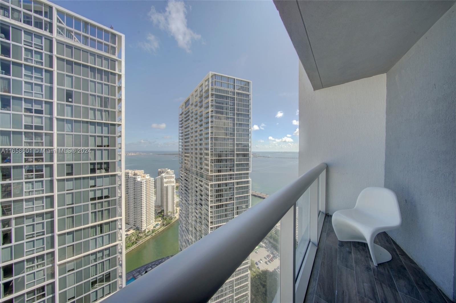 Icon Brickell Tower 3. Short term rental allowed. This specific unit is one of the highest grossing units in the building. Will provide rental data if requested. Located on the 46th floor corner unit offers tremendous views of Biscayne Bay, Miami River and stunning skylights at night. Floor to ceiling windows throughout. Unit is immaculate condition. Adjacent to W Hotel, this unit has no rental restriction perfect for investors. Airbnb approved, daily rentals. Amazing Bay Water view in one of the most prestigious buildings in Brickell Financial area. Walking distance to incredible restaurants and shopping mall Brickell City Center. Building offers full time concierge, 5 Star resort & restaurants, Hot Water, cable, Internet, one valet parking included on maintenance fees.