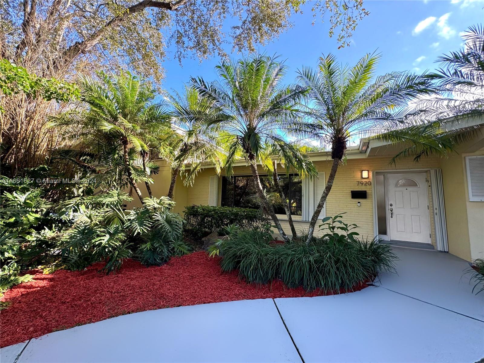 Prime Location! Charming split-level 3 BR/2 BA pool home in the heart of Pinecrest, surrounded by lush tropical landscaping. Enjoy the bright living room, spacious dining area, and inviting Florida room, all offering stunning views of the pool and mature fruit trees. Includes a versatile bonus room/office and a generous 2-car garage, all within the highly regarded Palmetto Middle and Senior School District.