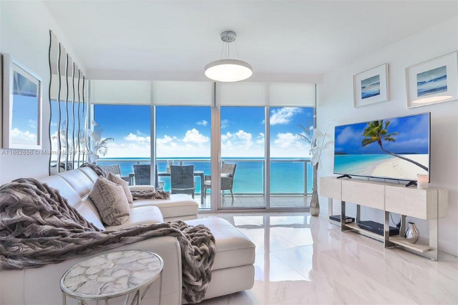 Step into the splendor of Sunny Isles Beach in this 39th-floor 'Unfurnished' gem. Offering a private foyer entrance to a spacious 2-bedroom + DEN layout with 3 full bathrooms. Enjoy your expansive terrace's incredible Atlantic Ocean views with direct East exposure. Luxurious amenities include a concierge front desk, beach service, valet & self-parking, fitness center, Spa, Café, kids' beach tent + play area, and beautiful sunrise & sunset pools. Experience beachfront luxury in an iconic 170th Street location; across the street, explore shopping, dining, and retail options for a vibrant, convenient lifestyle. *Note: Delivered Unfurnished. Lighting fixtures noted in images are not included. Schedule your private showing today and elevate your living experience at Jade Beach.