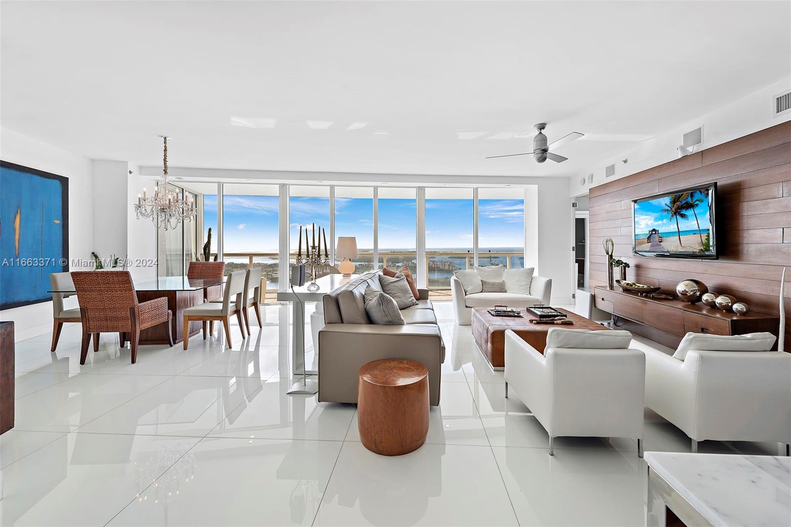 A must see unique unit! This professionally furnished high floor corner unit has it all. Located at of one of the most sought for buildings in the "South of 5th" neighborhood, with an oversized wrap around balcony, floor to ceiling windows and sliding doors, that allow for panoramic views of the ocean and of the Miami skyline. Designed by Phillippe Starck, the amenities are gorgeous, including a world class gym & spa, 2 pools, library, massage room, and charming outdoor restaurant/cafe. Unit has white marble flooring through out, solid wood TV wall in the living room, motorized screens and roller shade blackouts and top of the line appliances. Walking distance to the beach, to shops, and lots of cafes and restaurants. Close to South Point Park, and 15 mins to Miami International Airport.