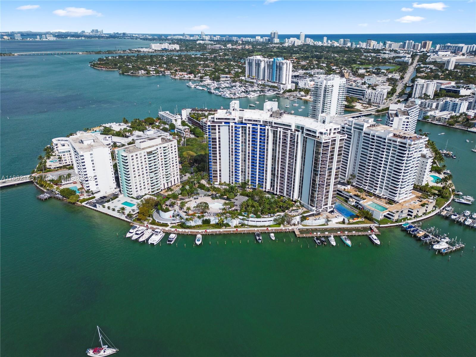 VIEWS! Rarely available 05 line. Stunning panoramic views of Biscayne Bay and Downtown Miami. Large living and dining area, newly installed floor to ceiling impact windows and doors, 2 large private terraces, beautiful eat-in kitchen, several expansive storage closets, large master bedroom with walk-in closet, laundry room, upgraded electrical panel and light fixtures, renovated bathrooms, separate storage unit and assigned covered parking. 24-hour concierge, valet, public spaces fully renovated: grand lobby, fitness center, yoga room, children’s play room, party room, huge landscaped pool deck with heated pool and jacuzzis under construction, tennis courts, boat docks and BBQ area. Across from iconic Miami Beach Standard, short distance to shops in Sunset Harbor & Lincoln Road.