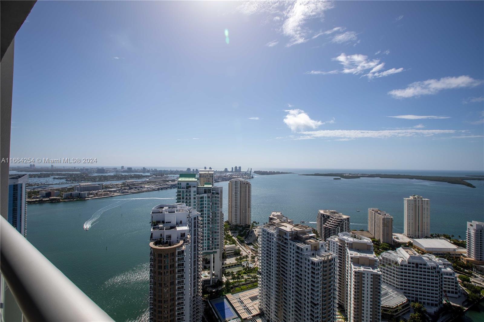 Experience unparalleled vistas at Icon Brickell from this fully furnished residence. Revel in the spacious luxury of this corner unit, boasting two bedrooms plus an expansive den accommodating two twin beds with ease. Enjoy breathtaking views of the Port of Miami and Brickell Key from the pinnacle of the 50th floor. This residence features top of the line appliances and grants access to premier amenities, ensuring a lifestyle of sophistication and comfort.