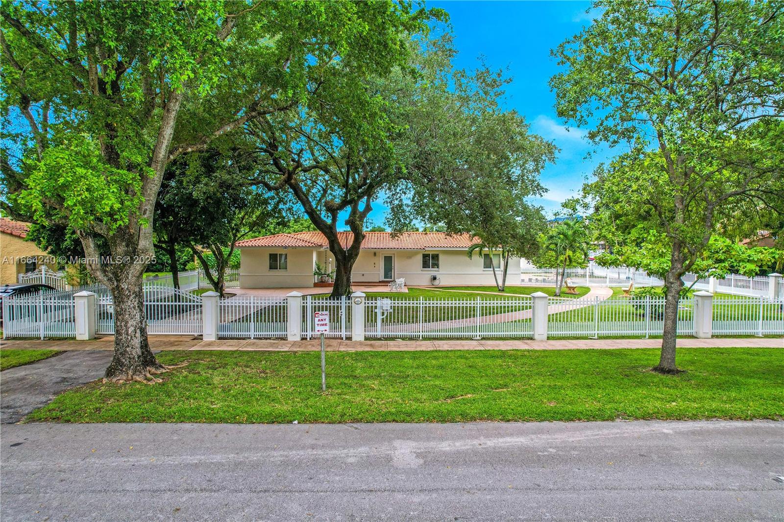 Immaculate and ideally located Coral Gables residence just minutes from the coveted Golden Triangle. This elegant 4 BR, 3 BA home spans 2,415 total sf, showcasing a seamless blend of classic charm and tasteful modern upgrades. Nestled on a sprawling 16,178 sf gated lot, the property features a secured wrought iron fence for enhanced privacy and is surrounded by mature landscaping. The expansive outdoor areas are perfect for entertaining or relaxing. Inside, enjoy spacious living, dining, family room, kitchen, updated primary bath, and air-conditioned garage or flexible storage. Ample parking included. Rare 3-lot offering presents potential for expansion or new construction. Convenient to Brickell, top schools, shopping, dining, and Miami Airport. An exceptional opportunity!