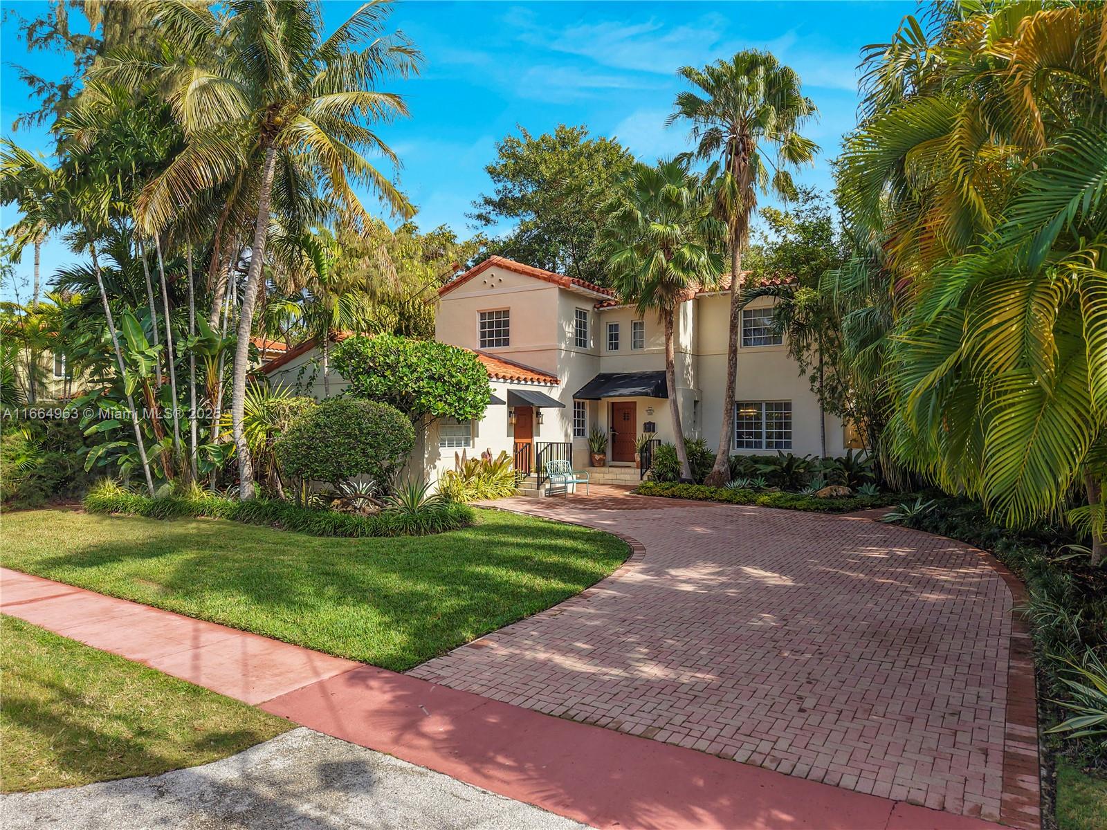 New On the Market! Beautiful Spanish Mediterranean Home On mid-Miami Beach. Situated in a most desirable location on a quiet one block street in Mid-Beach, this beautiful Spanish Mediterranean home offers close to 3,500 square feet of well-appointed living space. It features a bright, large, newly renovated kitchen, 5 bedrooms and 4.5 baths, a spacious dining room, crisp, contemporary in-law/office suite, and a warmly furnished den overlooking the spectacular back yard with an oversized newly rebuilt heated pool, 6-person hot tub, tree house, play area, outdoor living and dining areas, breakfast patio, and lush old growth trees. With an almost 10,000 square ft. magnificently landscaped lot, it’s like living in your own glorious resort setting!