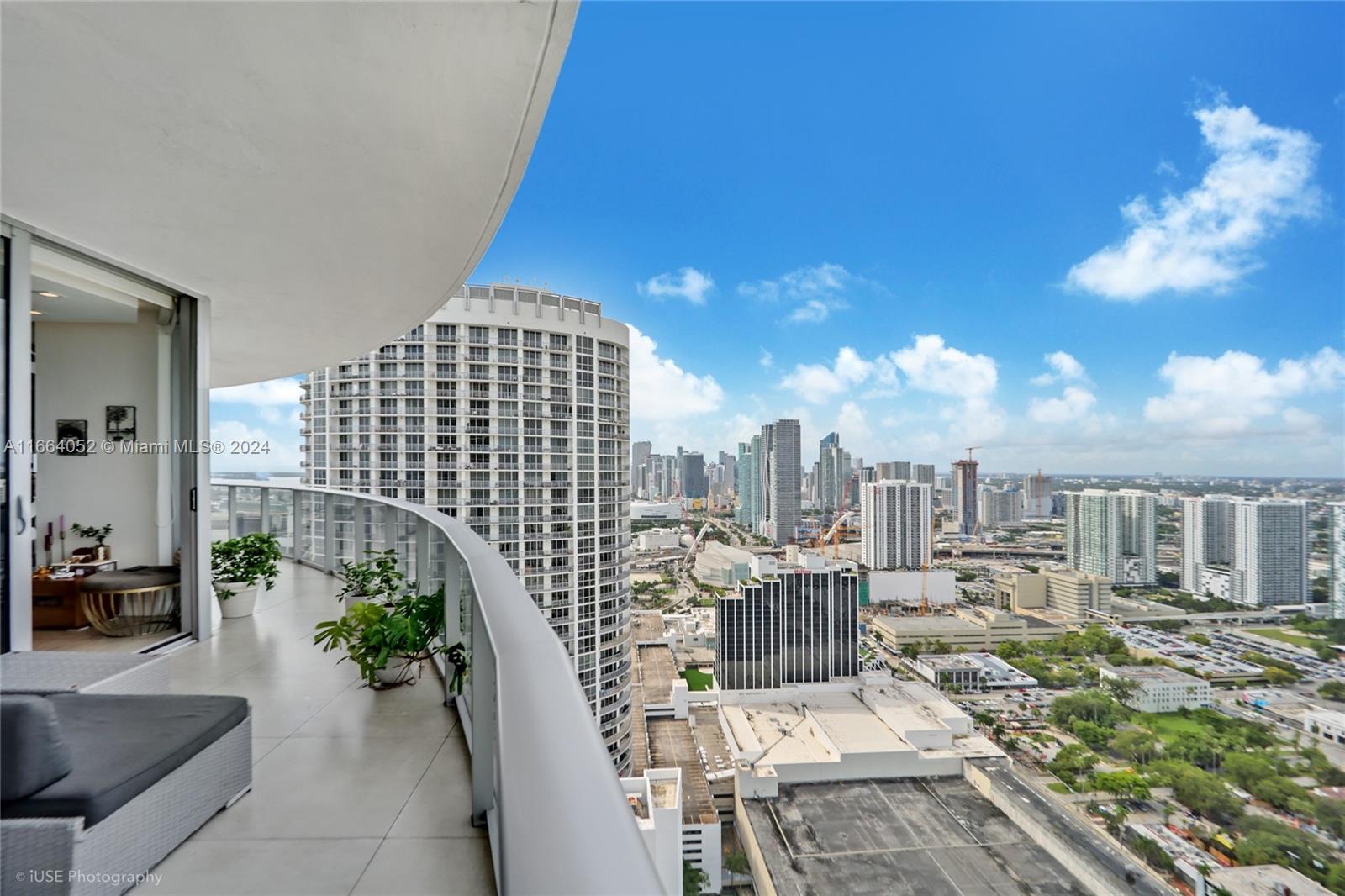 Experience luxury living in this stunning 2-bedroom, 2.5-bathroom residence at Aria on the Bay in vibrant Edgewater. This upscale unit features expansive balconies with breathtaking views of the lively Miami skyline. The open-concept kitchen is equipped with Bosch appliances, European cabinetry, and a sleek quartz countertop. Additional highlights include impact windows and custom walk-in closets. Aria on the Bay is a pet-friendly building offering world-class amenities such as two pools (sunrise and sunset), a state-of-the-art gym, lounge, bar, spa, yoga room, barbecue area, business center, children's playroom, valet parking, and more. Enjoy the best of Miami living, just steps from top restaurants, museums, South Beach, Brickell, Midtown, and Downtown.